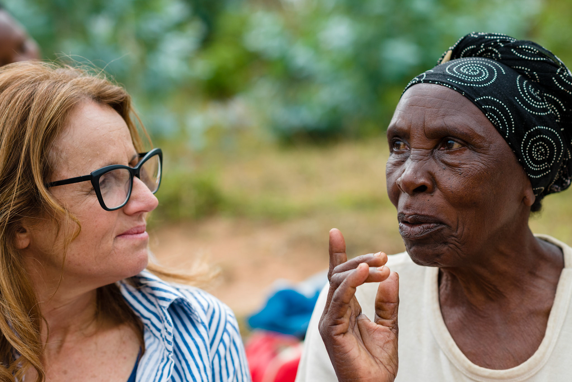 Kelley listens to Ancille tell of her experience with the self-help group.

Ancille is one of the older members and has health problems. She struggles to work for an income, but is suppoerted by her group.

She is managing to raise rabits for sale as food, an idea suggested by her self-help group.