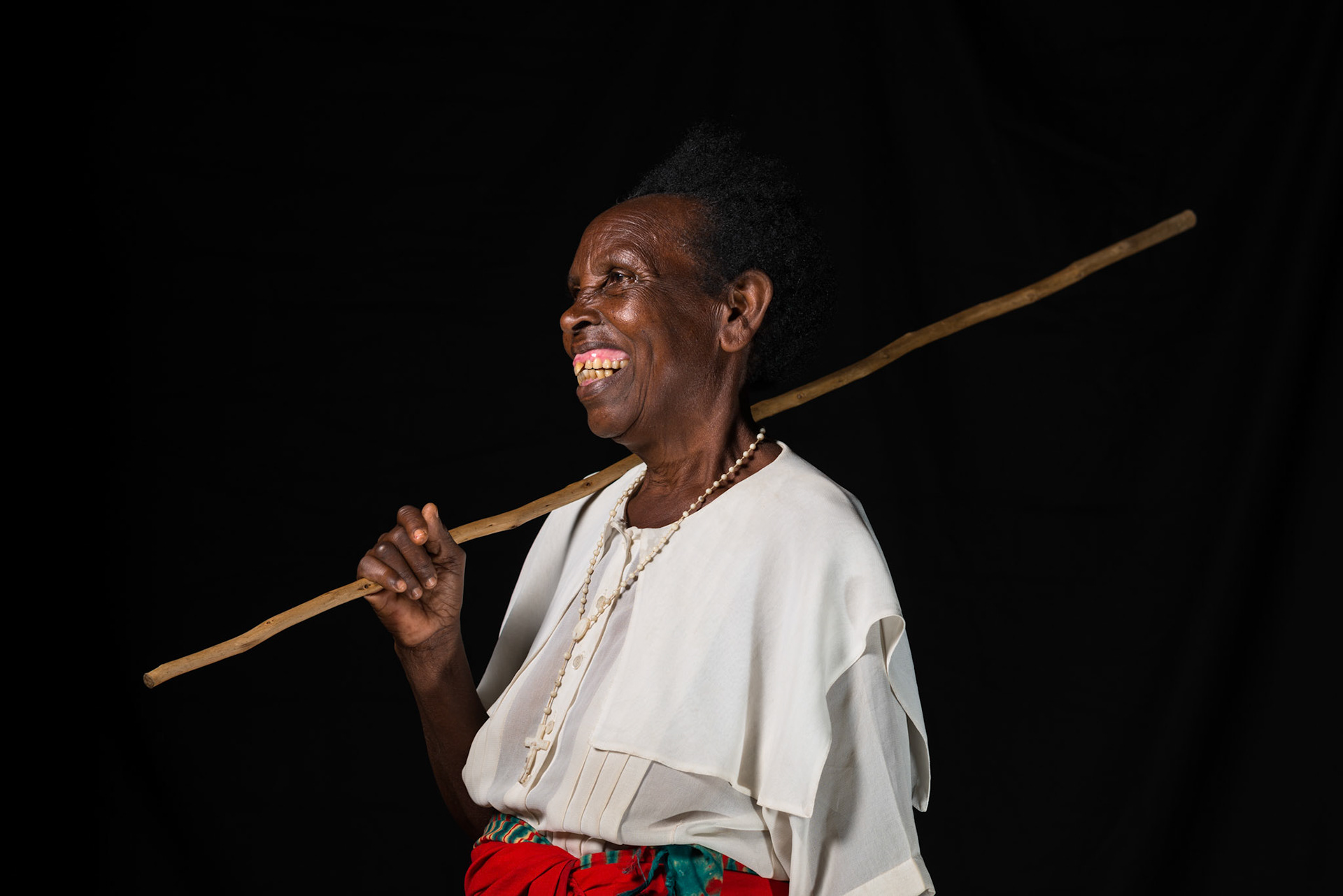 After her first year, Ancille sat for a portrait photo. In one year, she says that she is much happier, and now has support around her.