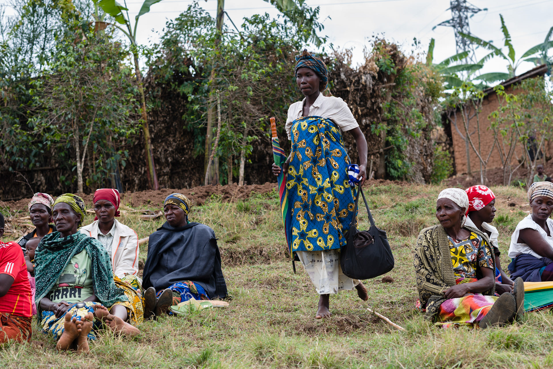 Immaculate arrives at the first meeting of her group after the formation event. Her group chose the name "Abisungay", that translates as "leaning on each other". It could also translate as "mutual support"