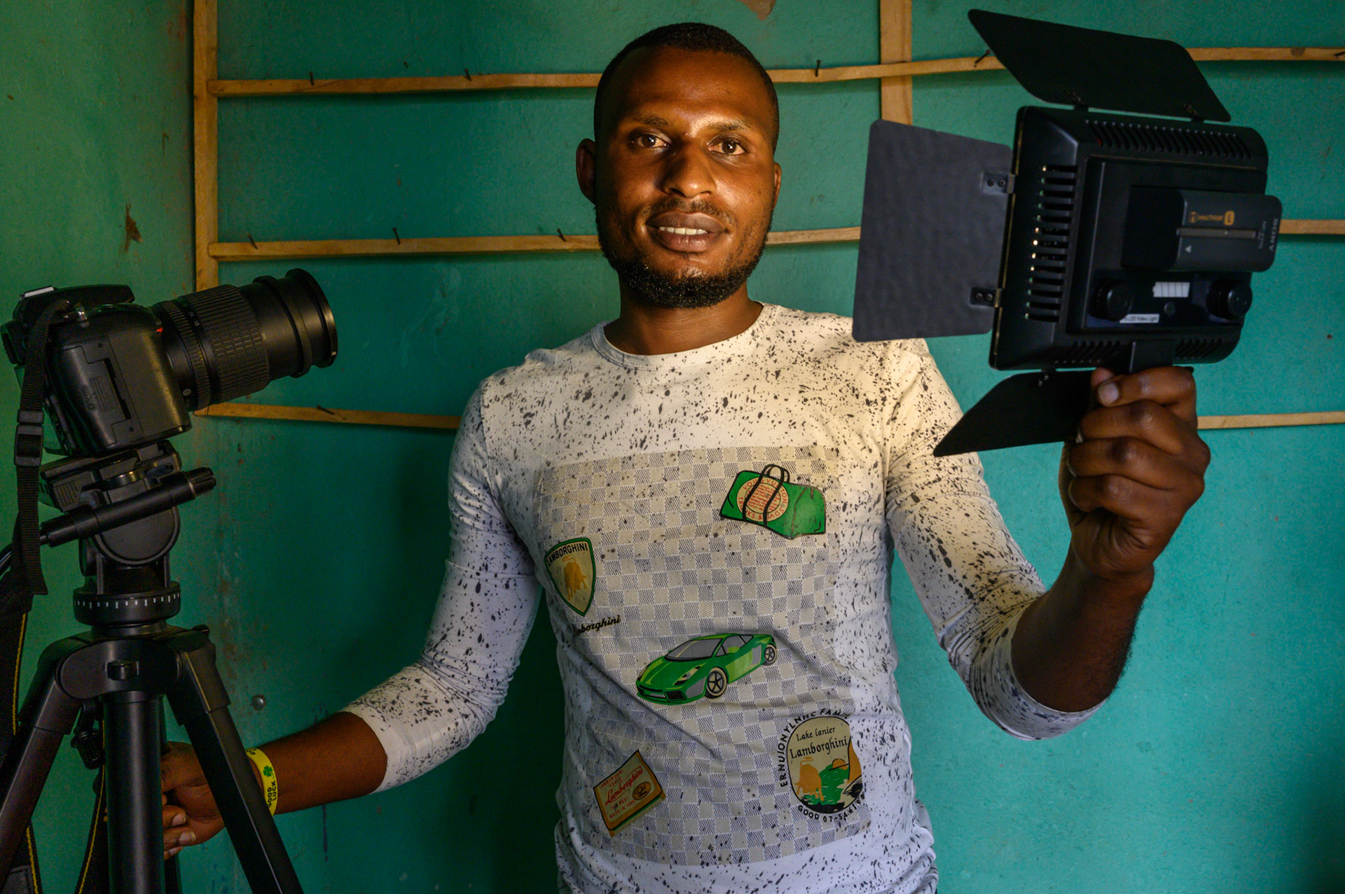 After completing a course in photograoby and design, Emmanuel decided to move to a small town near the Burundi border rather than compete in Kigali. He has leased a camera, lighting, latop, and sound system. He is the only person in the area to provide this capability for weddings and local events.