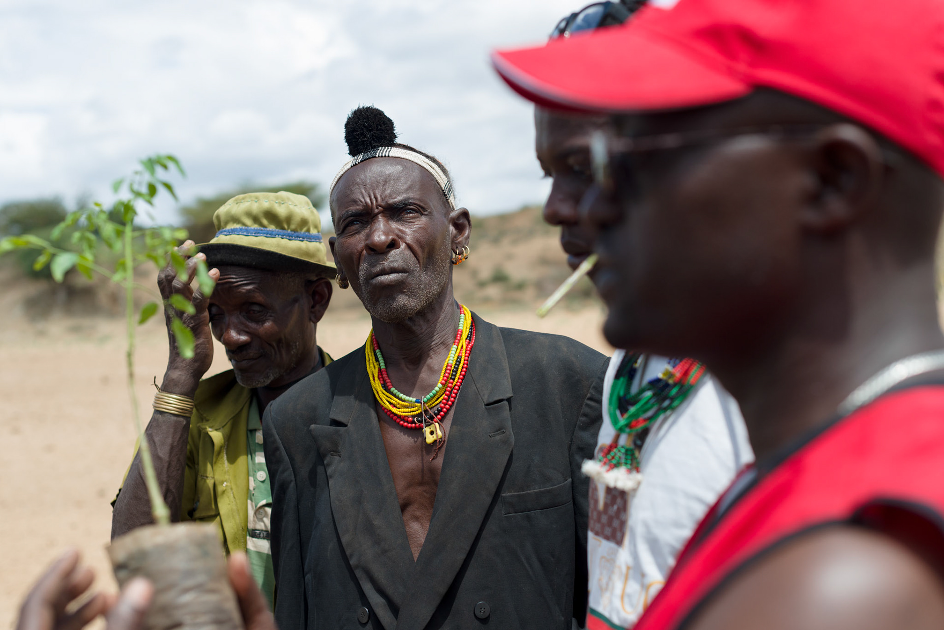 ERCS project coordinator Akna Atana explains the care and cultivation of morninga plants with the Hamer beneficiaries in the Asile kabele, Turni woreda, South Omo
