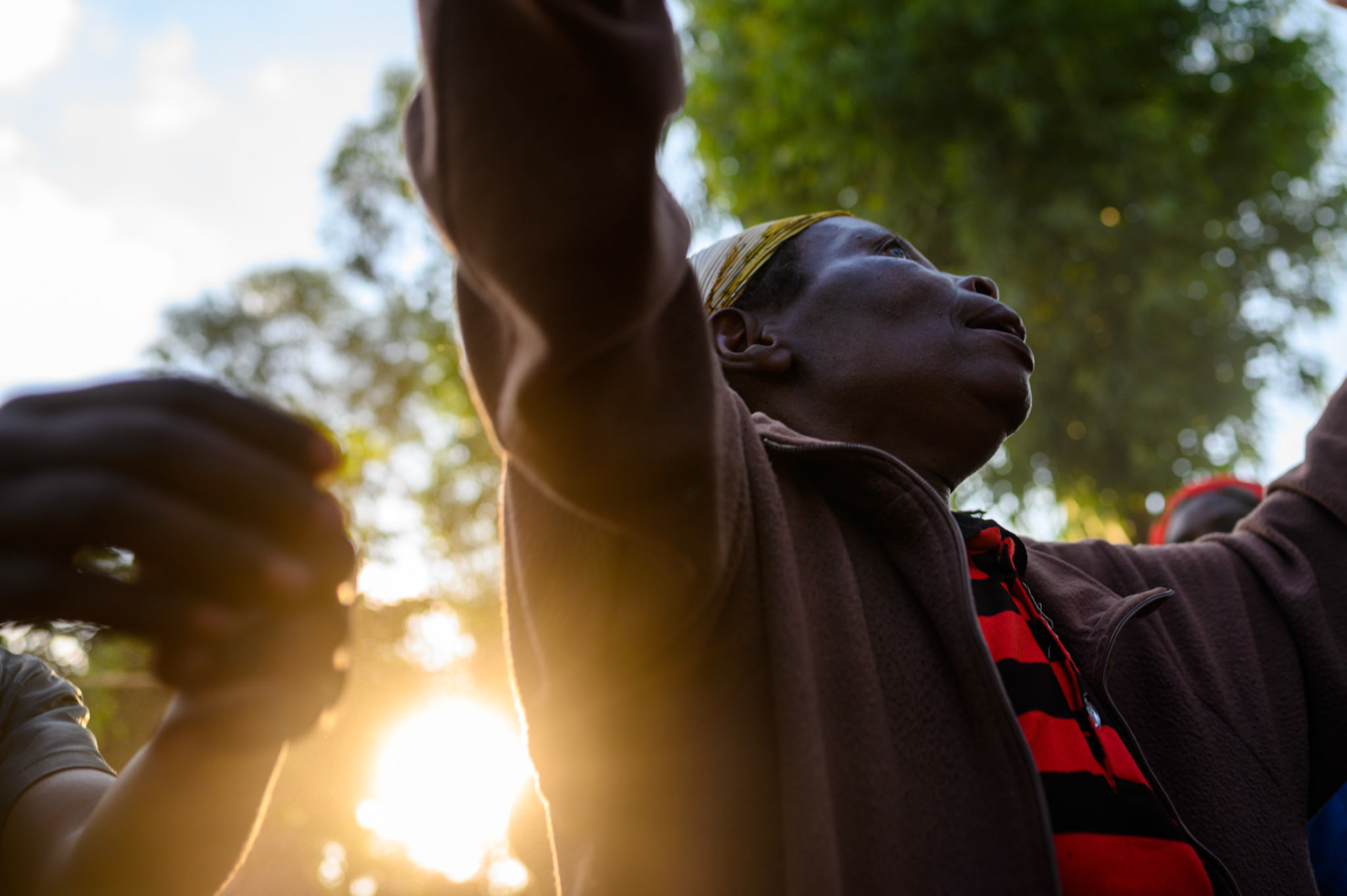 Women of the Bwama self-help groups dance in farewell for the Rawandan NGO that supports their self help groups.