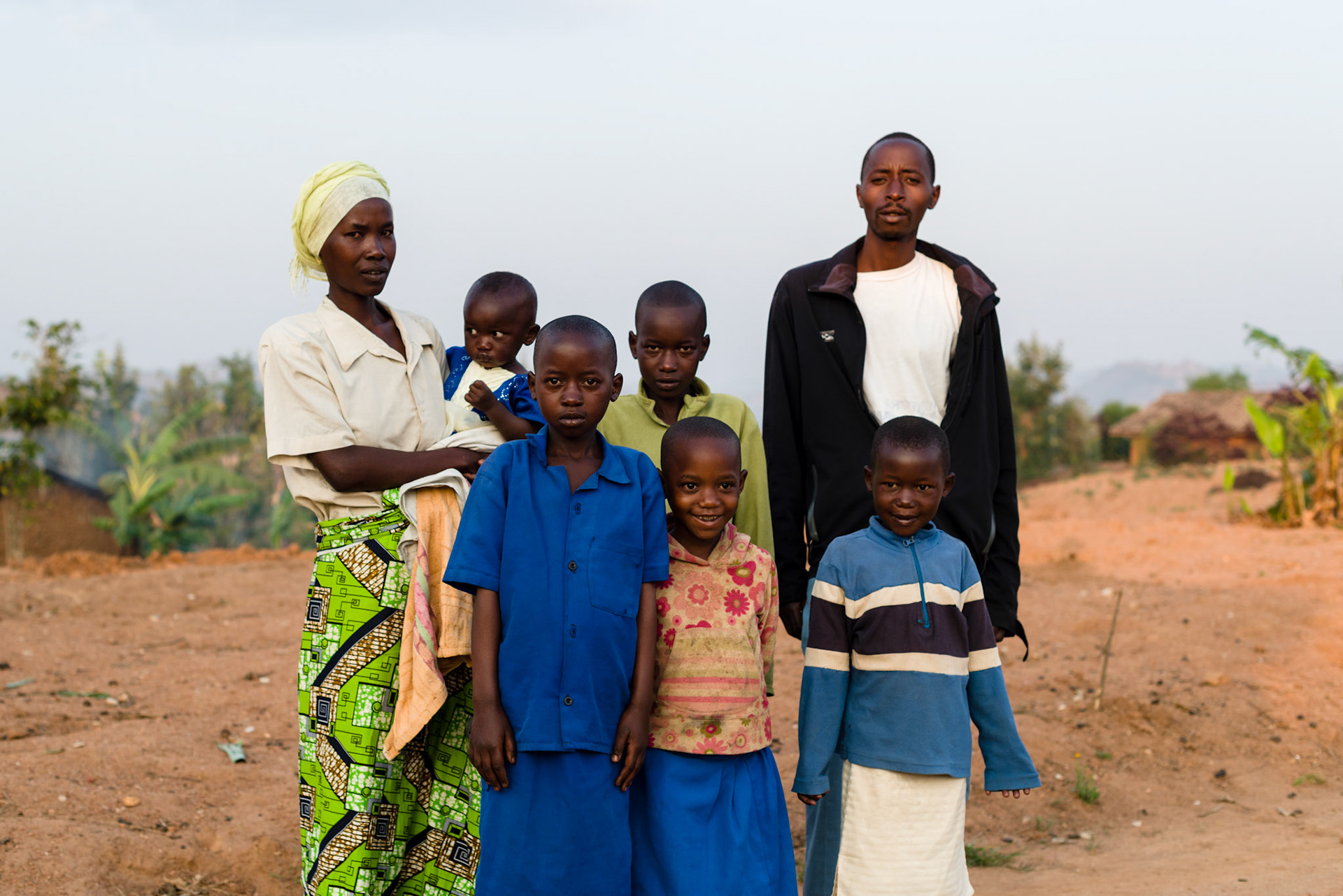 Immaculate with her family a year after joining her self-help group, from L-R, Immaculate, Clarisse, Denise, Tuyrize, Sandrin, Delphine, and Emmanuel