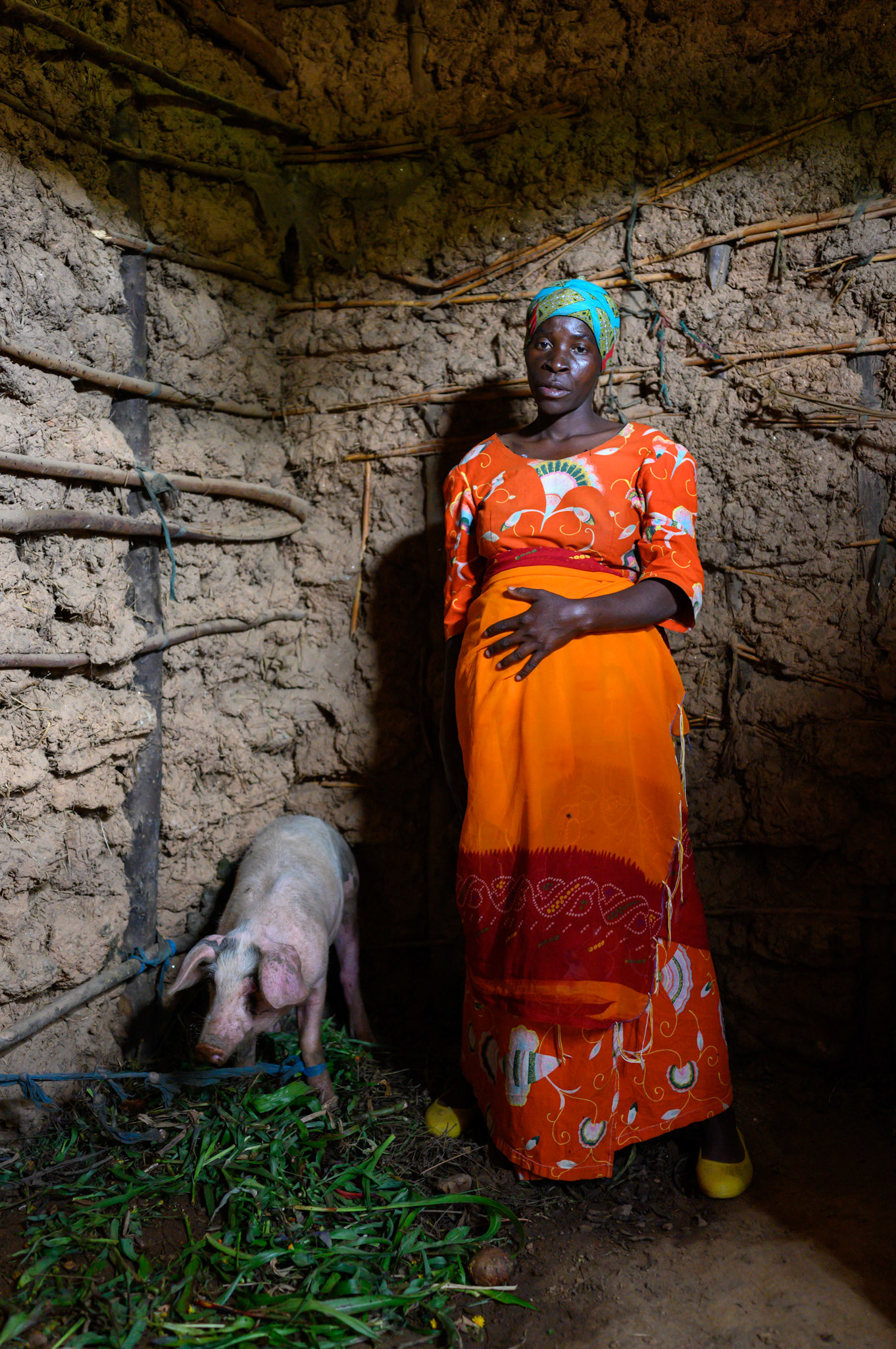 Philomene with her pig.


Philomene is now expecting her fourth child but says she is not concerned, she can afford the extra child.