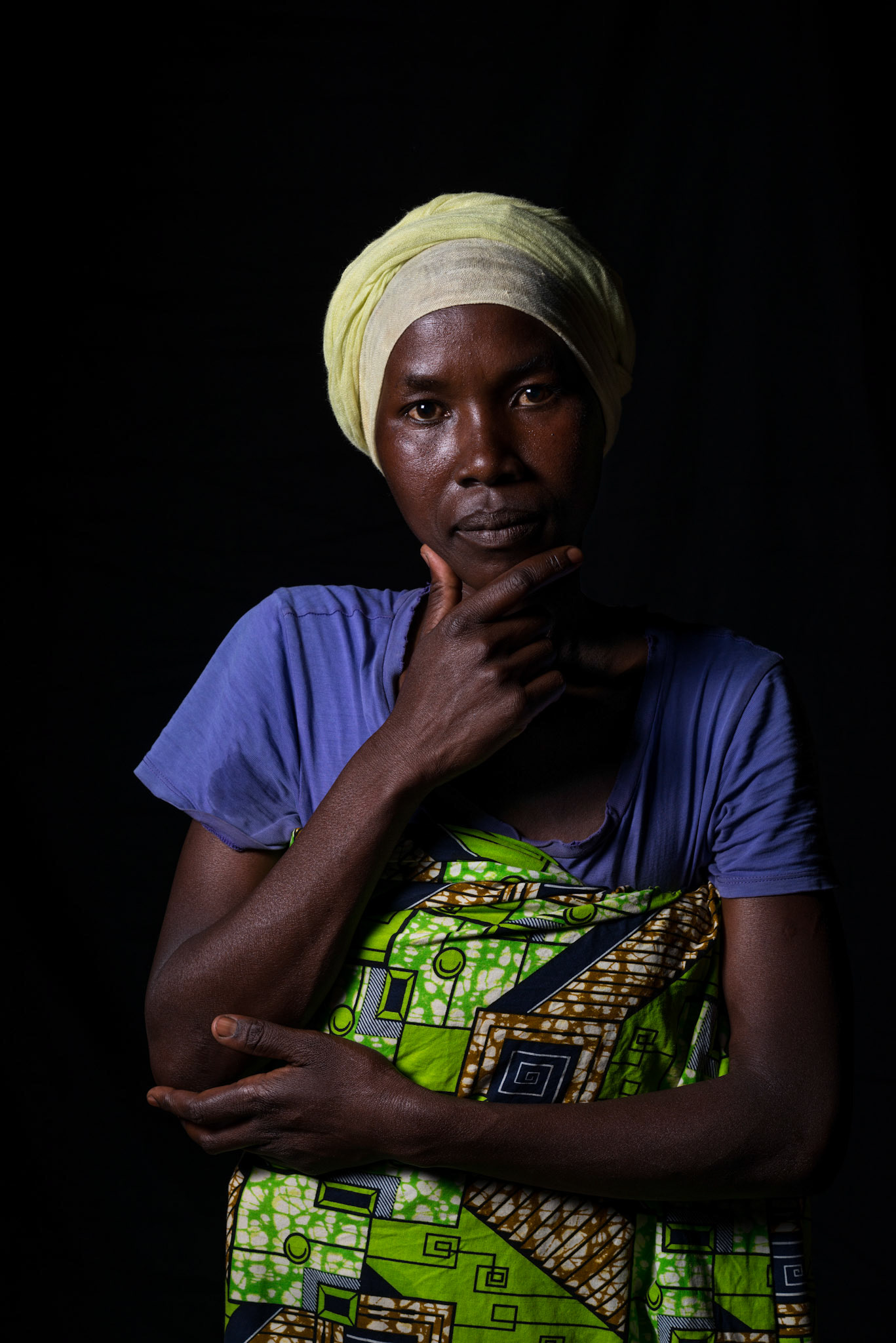 A year after joining her self-help group, Immaculate sits for a portrait.