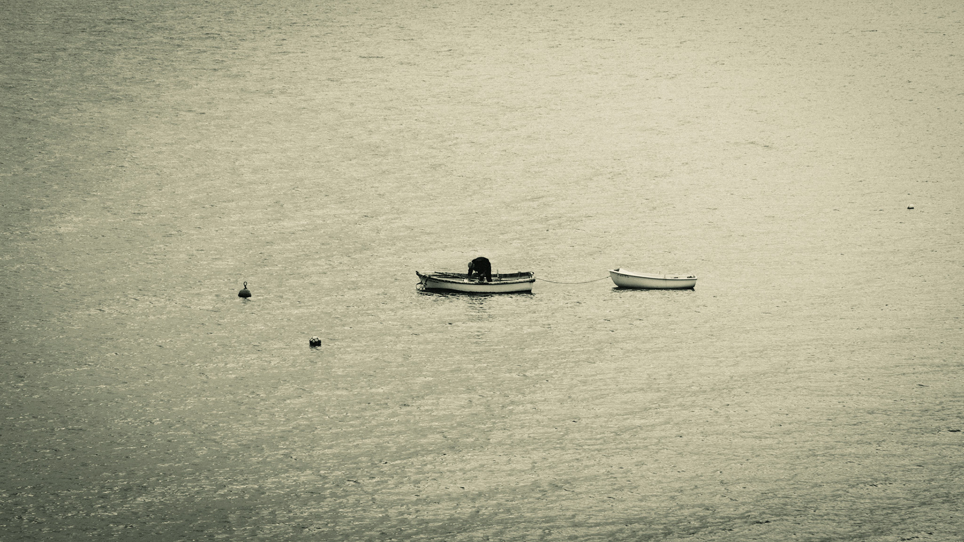 Pescador y su barca