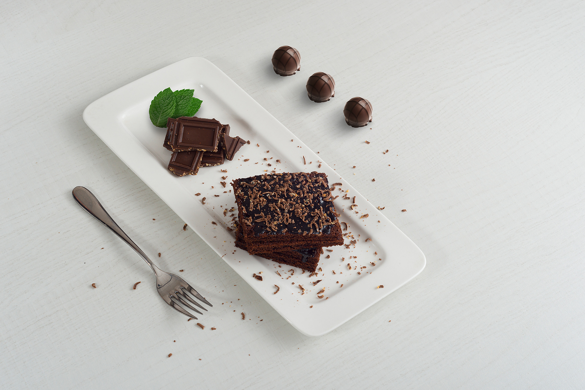Профессиональный снимок шоколадного десерта брауни для сайта заказчика