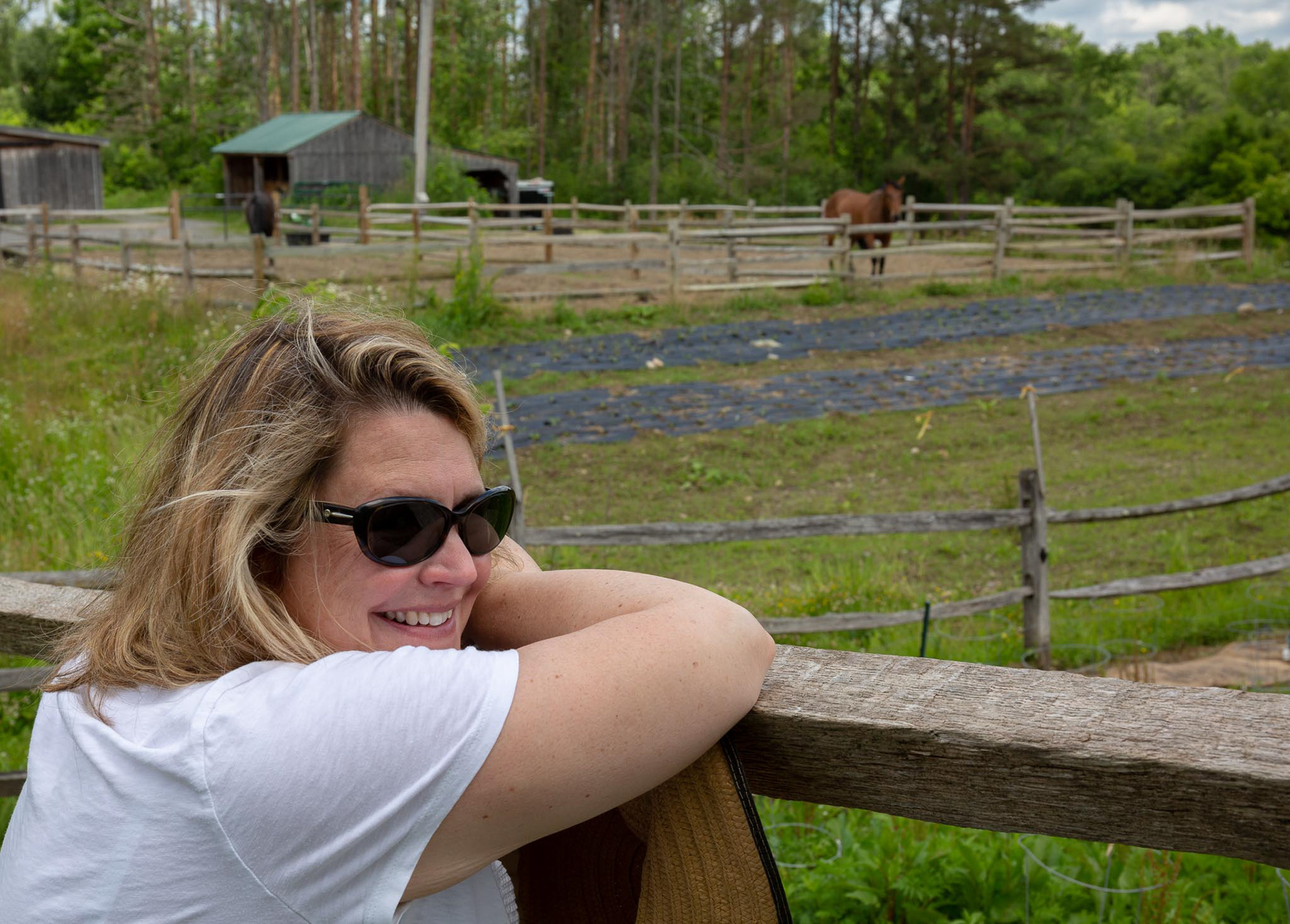 Kristin Heltman-Weiss looks out over the Somali Bantu Community Farm in East Aurora, NY  
