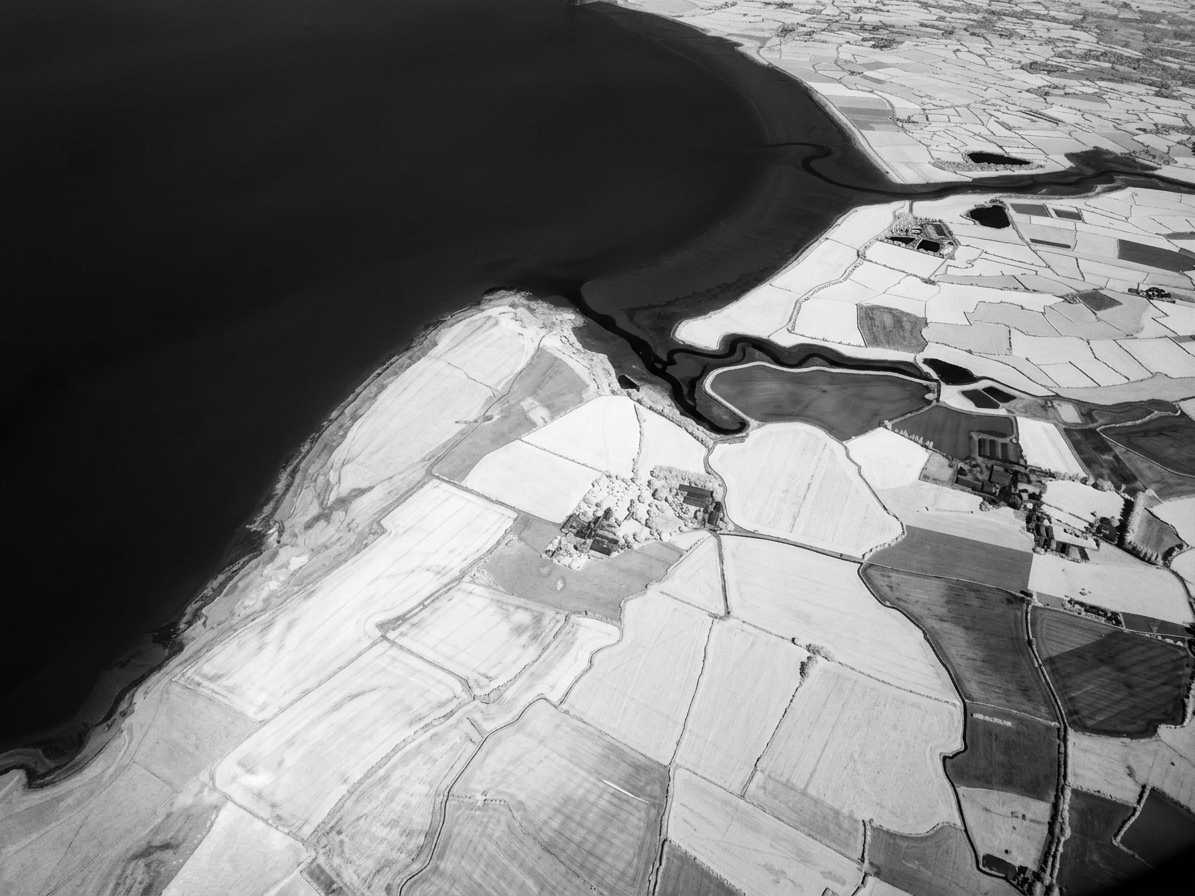Shot taken in aeroplane over England on the way back from Dublin converted to infrared in Photoshop June 26