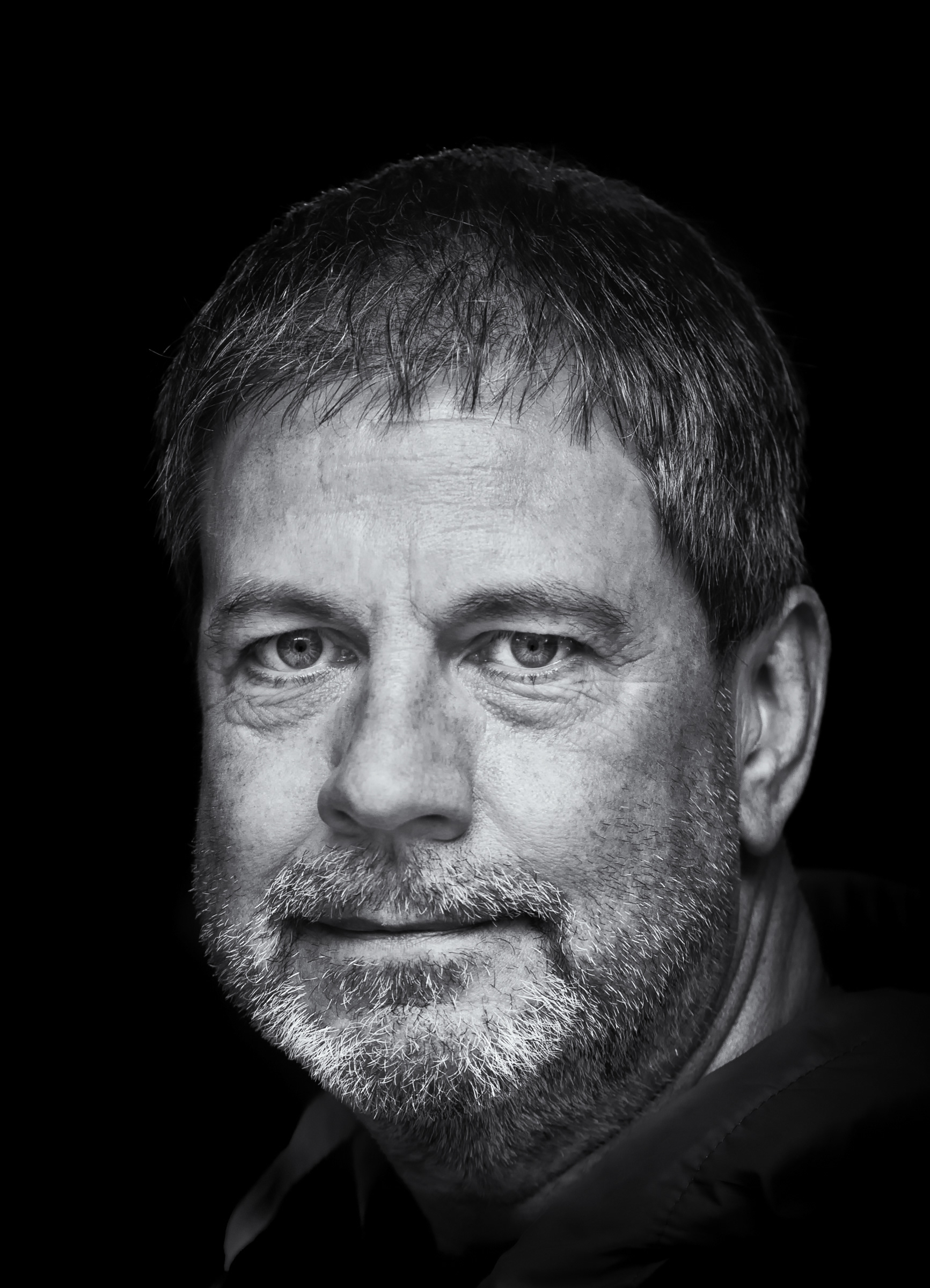 Kenny, a fellow photographer. This photograph was taken outdoor in natural light, even though it looks like a studio shot.