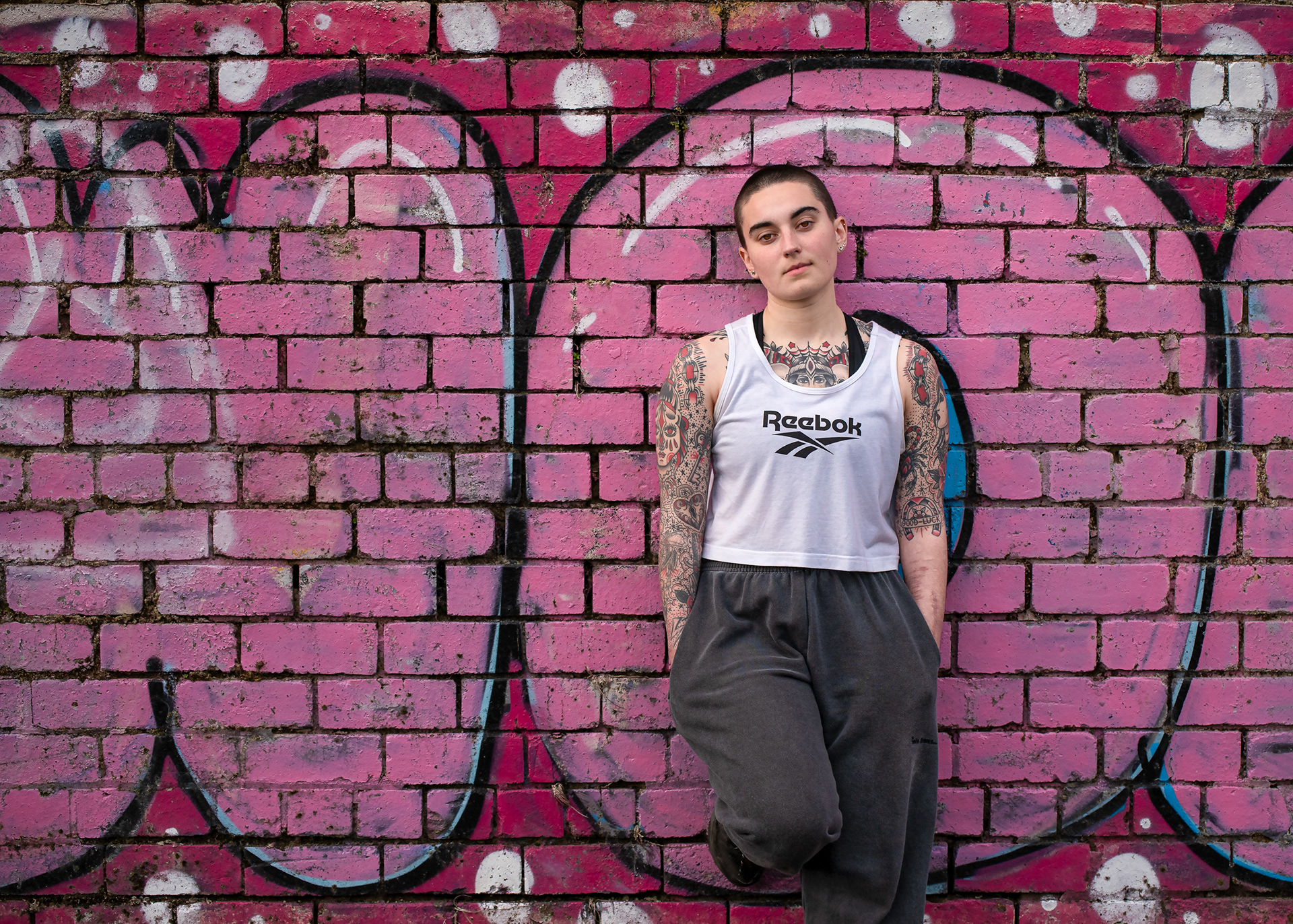 The Graffiti Artist. Adel looking very happy to be outside in a t shirt late in the evening.