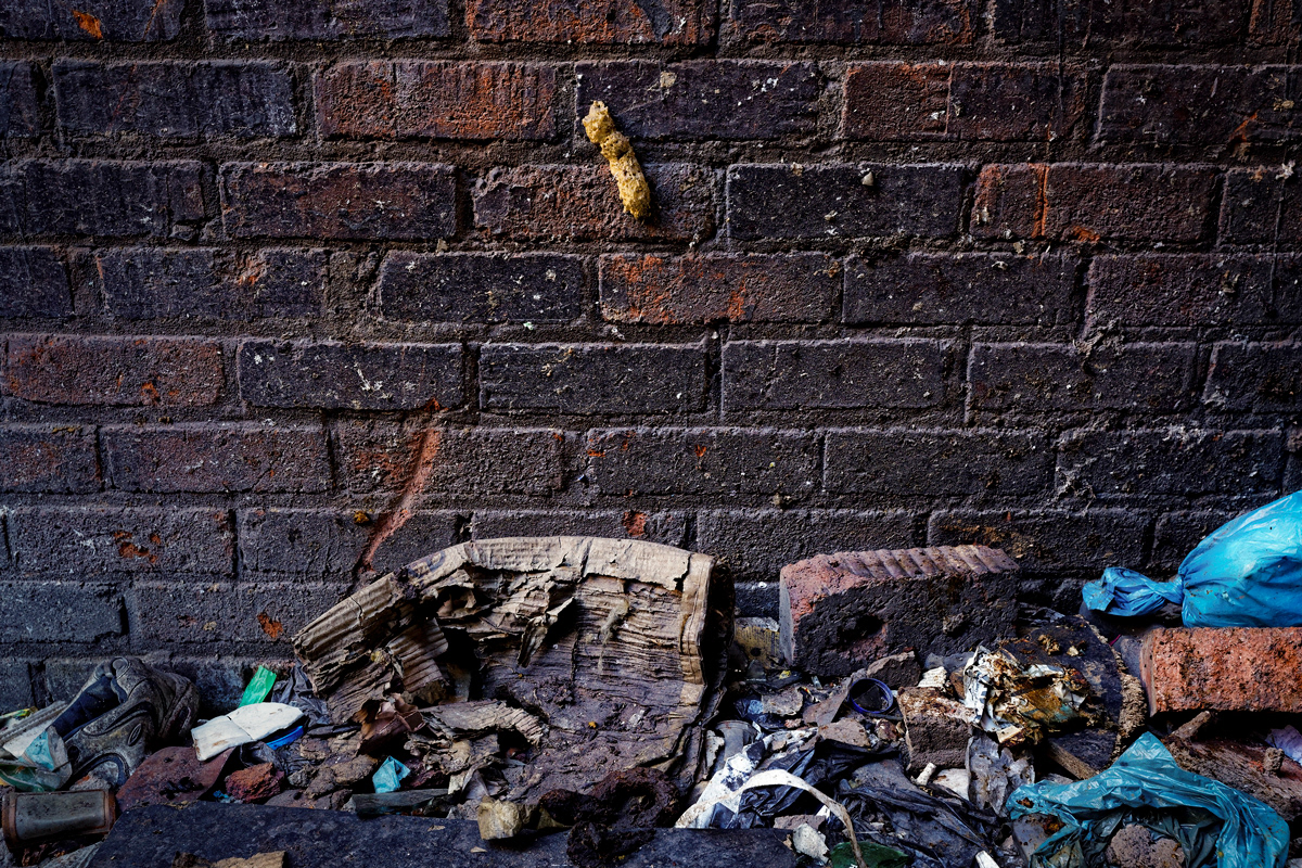 Shit On Wall 2014 - 2016 Photographic Print Fine Art Cotton Fibre A1. Living conditions are incredibly difficult for residents of dark buildings without running water and electricity. Residents use buckets overnight as toilets and at dawn the contents are discarded out of windows, down elevator shafts or onto fire escapes.