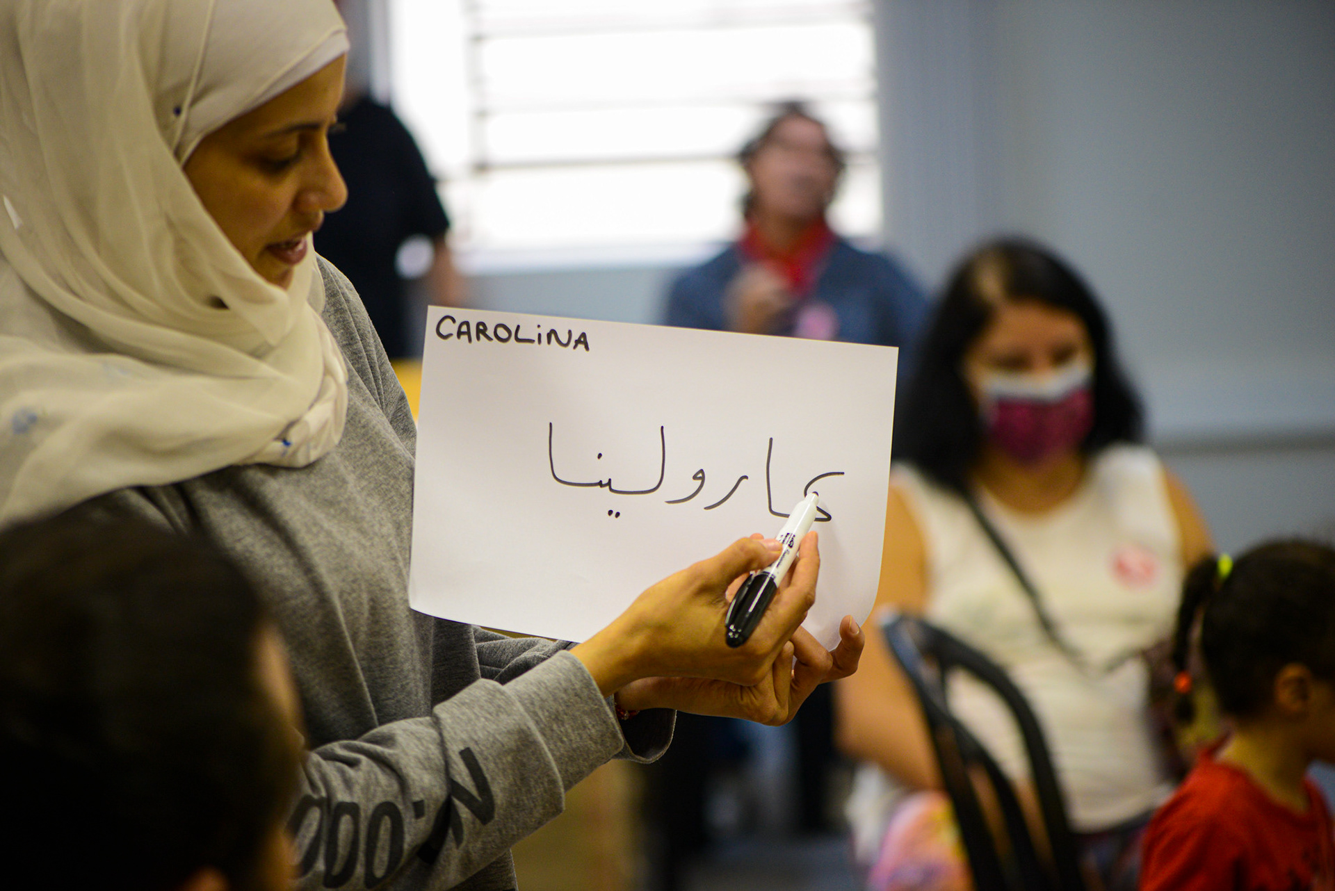 Oficina de caligrafia árabe na Festa do Imigrante