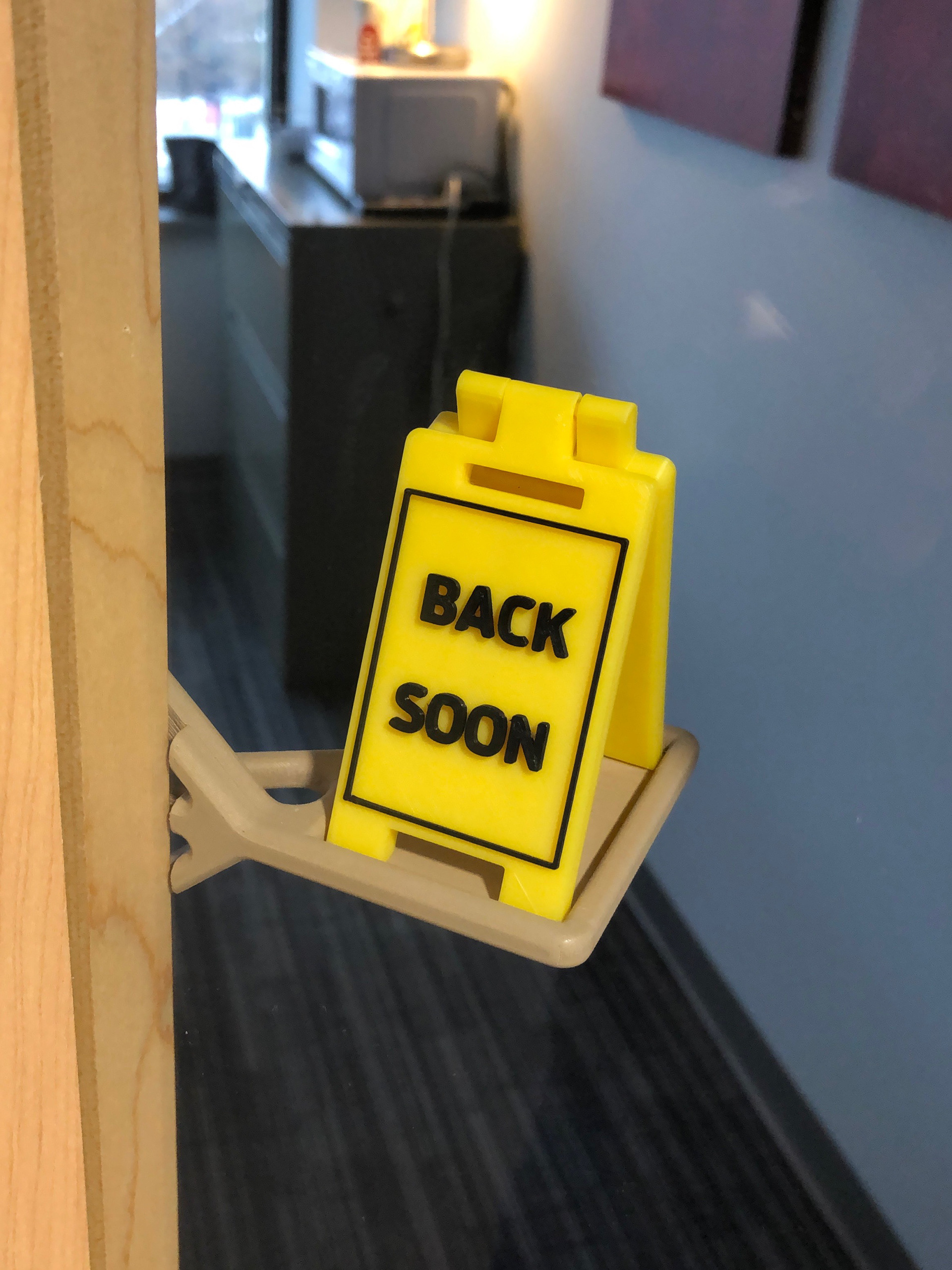 "Back Soon" office sign