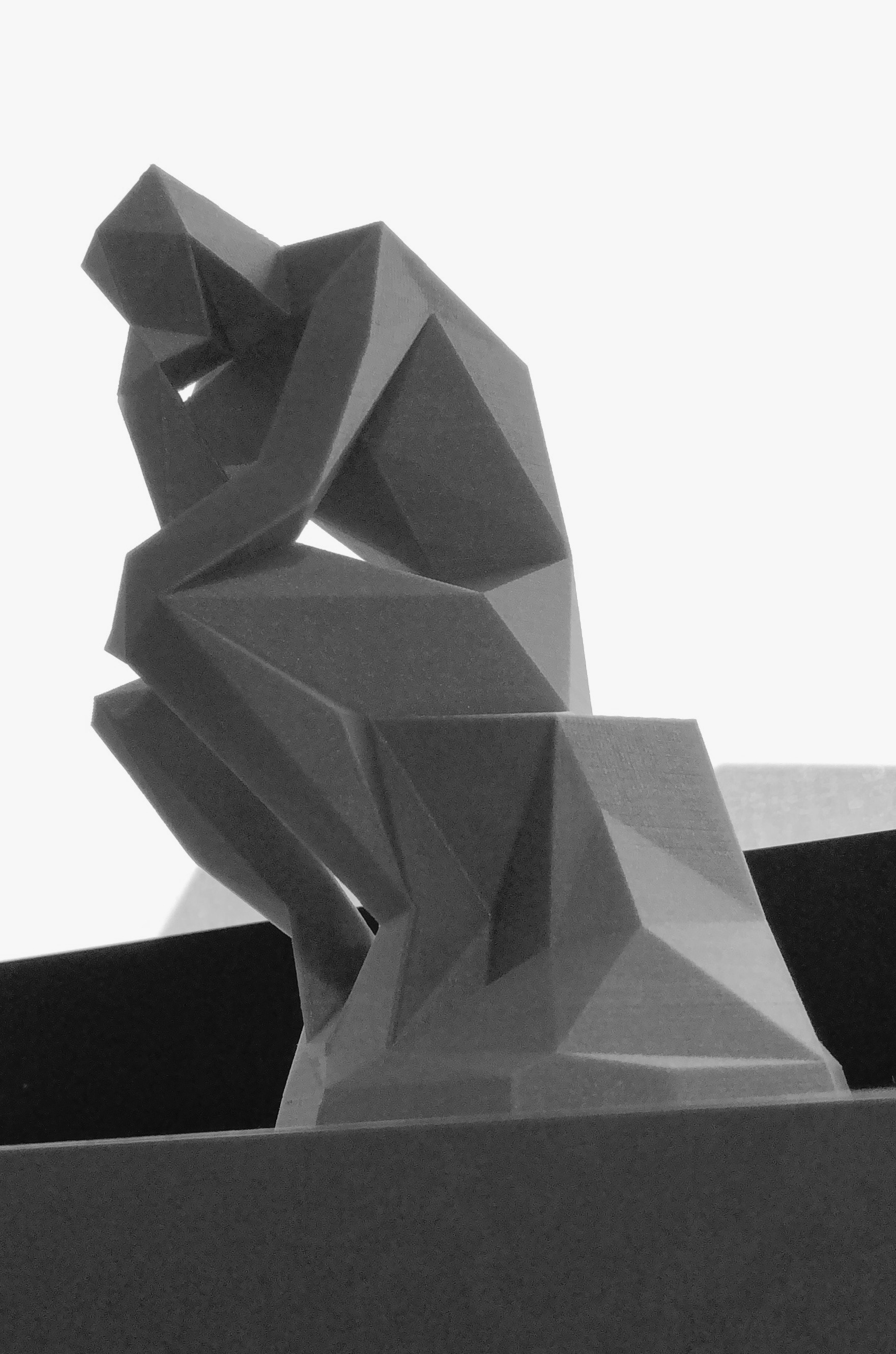 Low-poly "The Thinker"