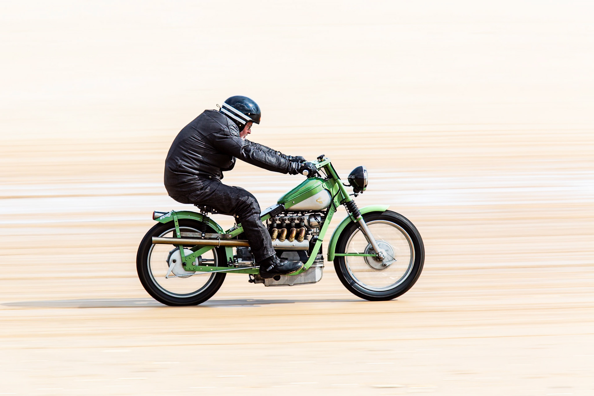 Race the Waves. A gentleman on a Nimbus on the sand. Bridlington. April 2023