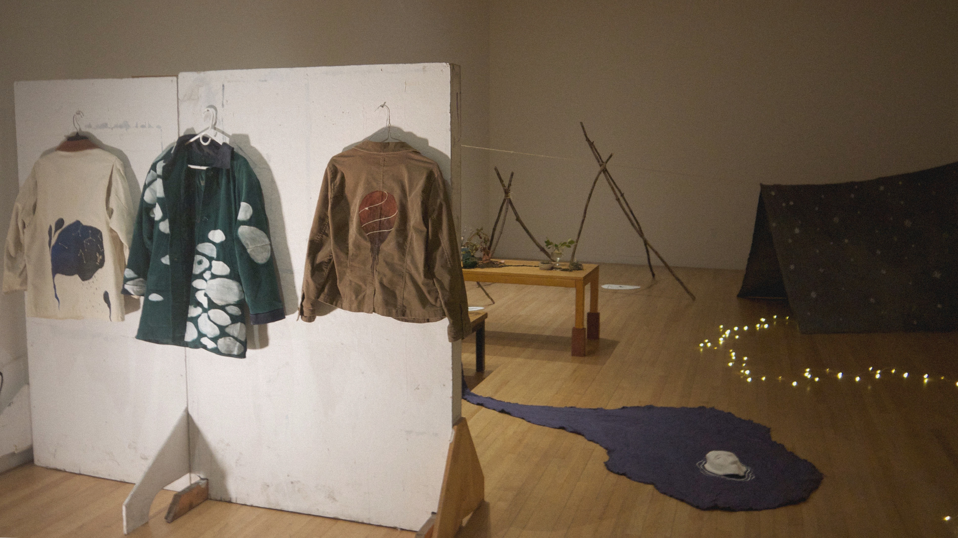 on left: empathic jackets, to be worn while viewing (sleeves sewn shut, rocks in lining, sleeves sewn to body)