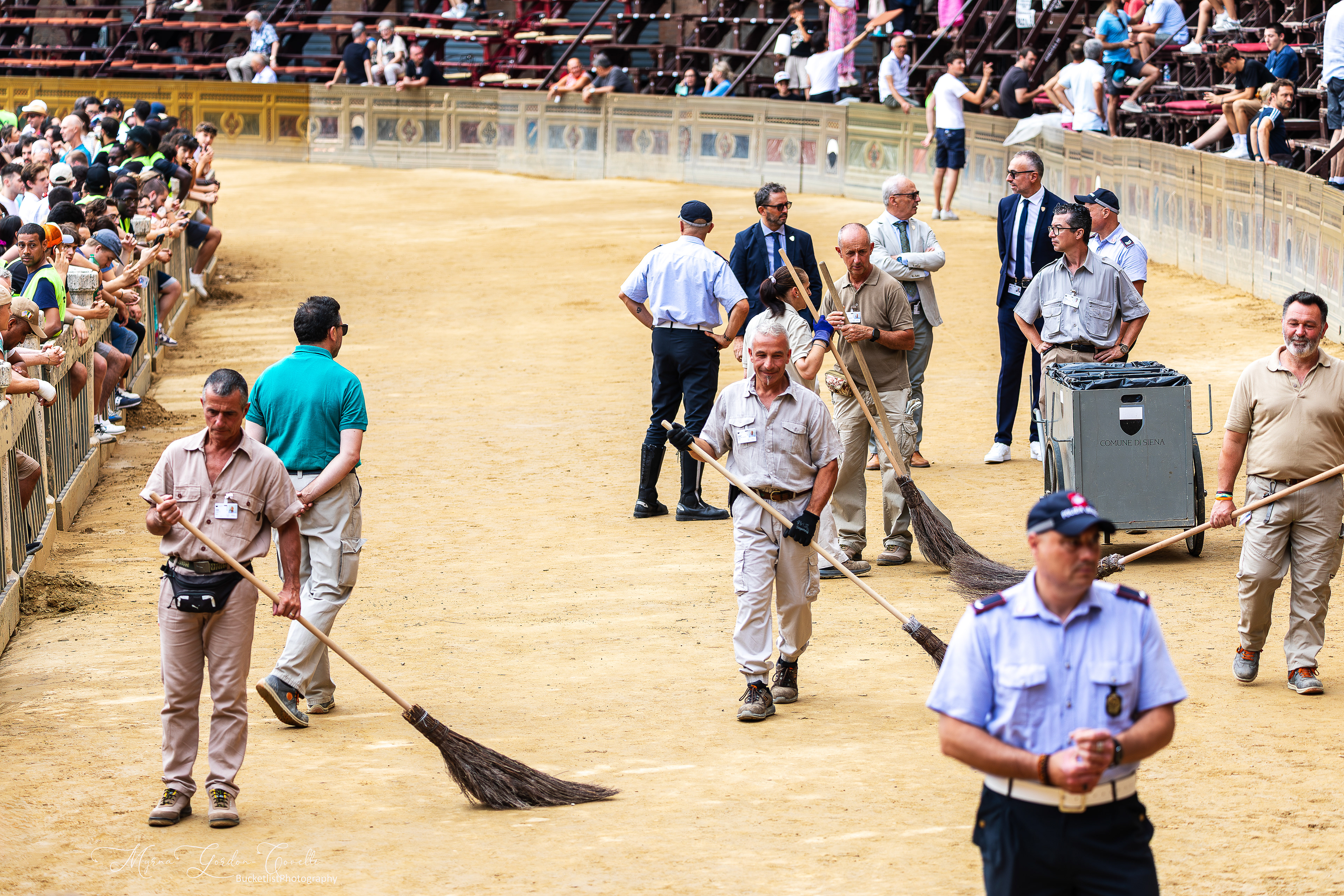 The important cleaners sweeping the mess off the track