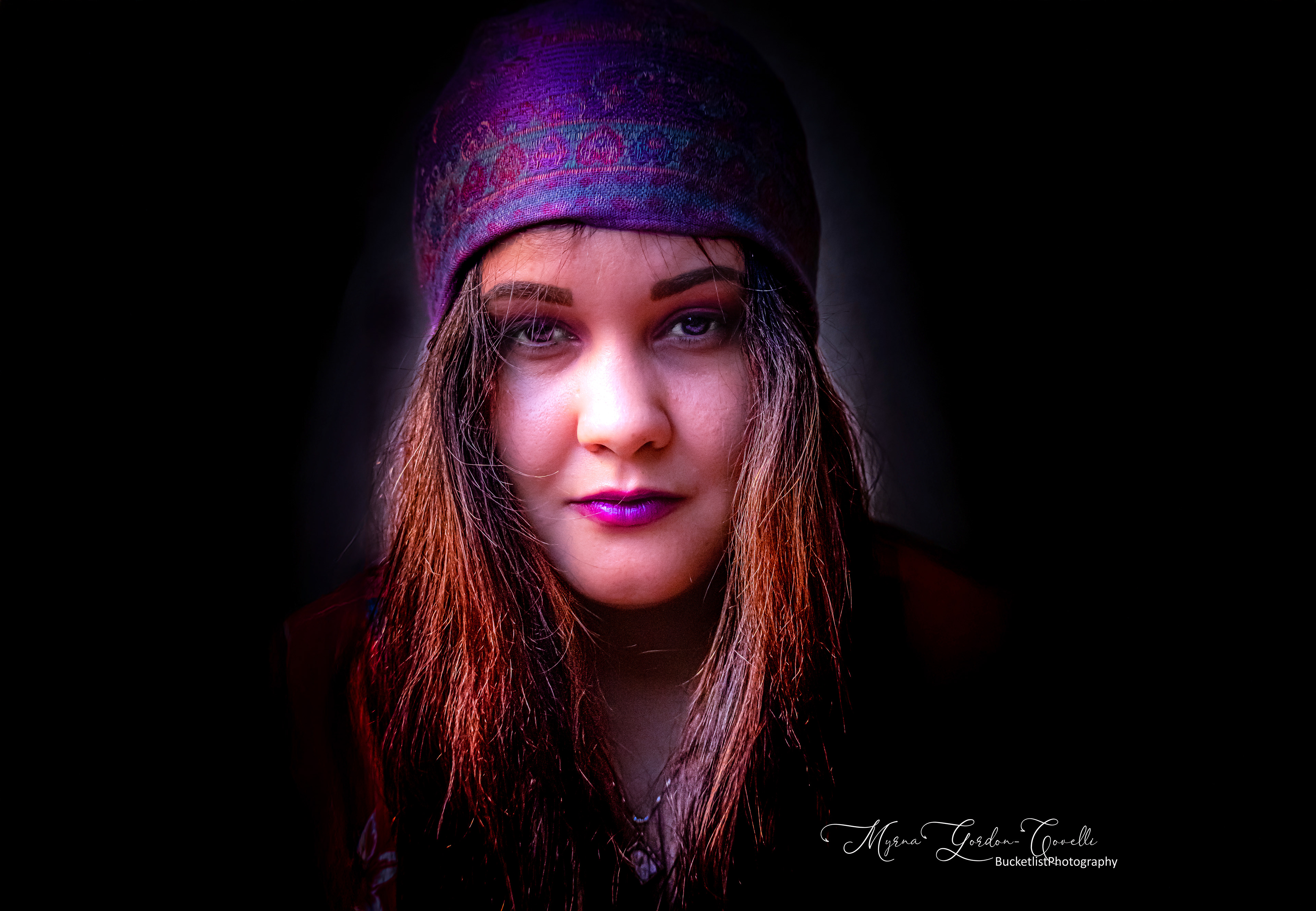 Girl with Purple Scarf on her head with purple lipstick and sultry eyes