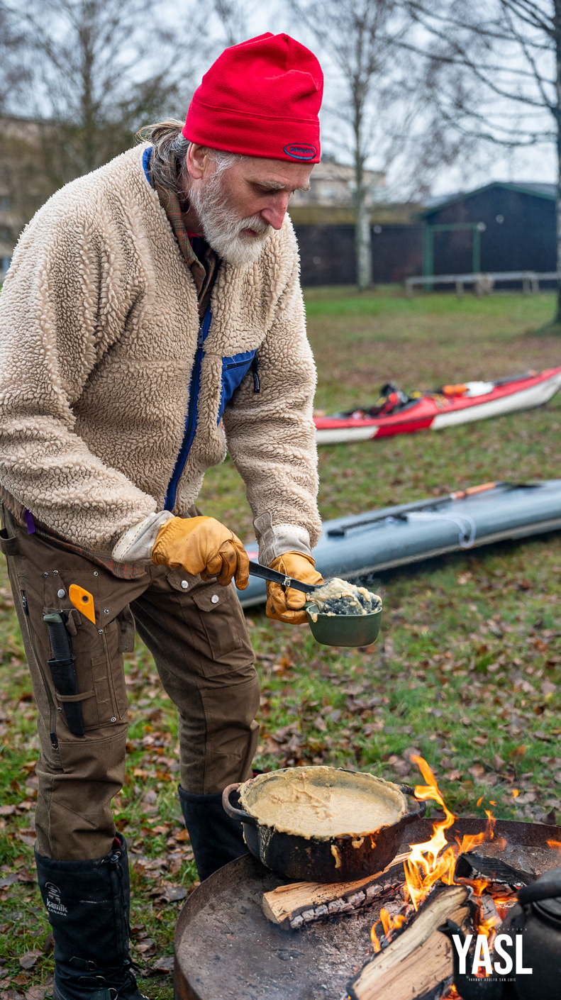 Erik Wallgren serving the traditional hot pea soup after 8th Annual Bråviken Cold Feet Paddle Race