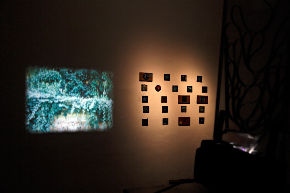 View of the installation with slides and projector