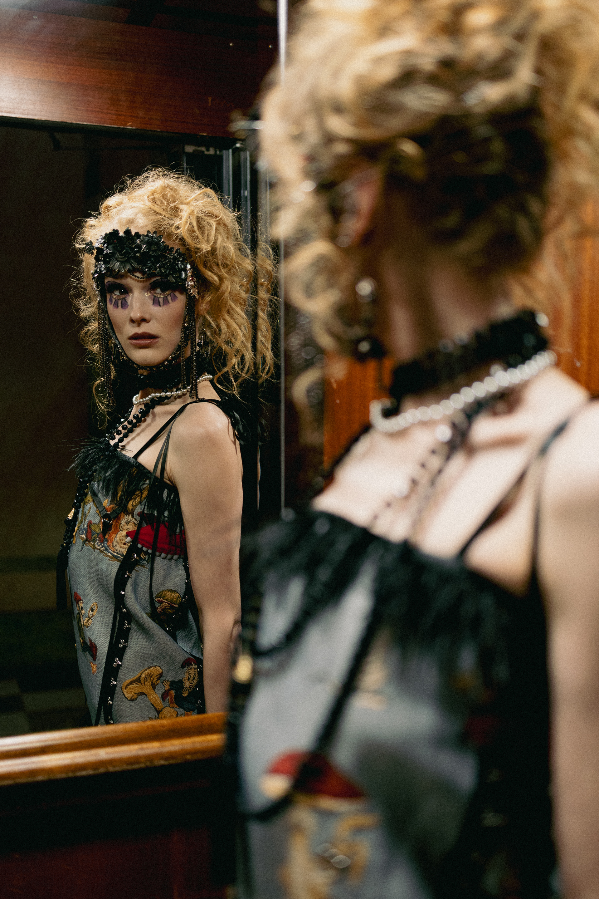 Sasha Sytenko — fashion portrait reflected in a mirror.