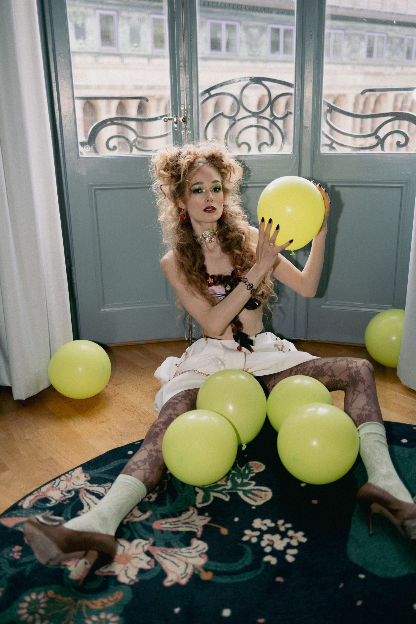 Sasha Sytenko — white couture and lime balloons.