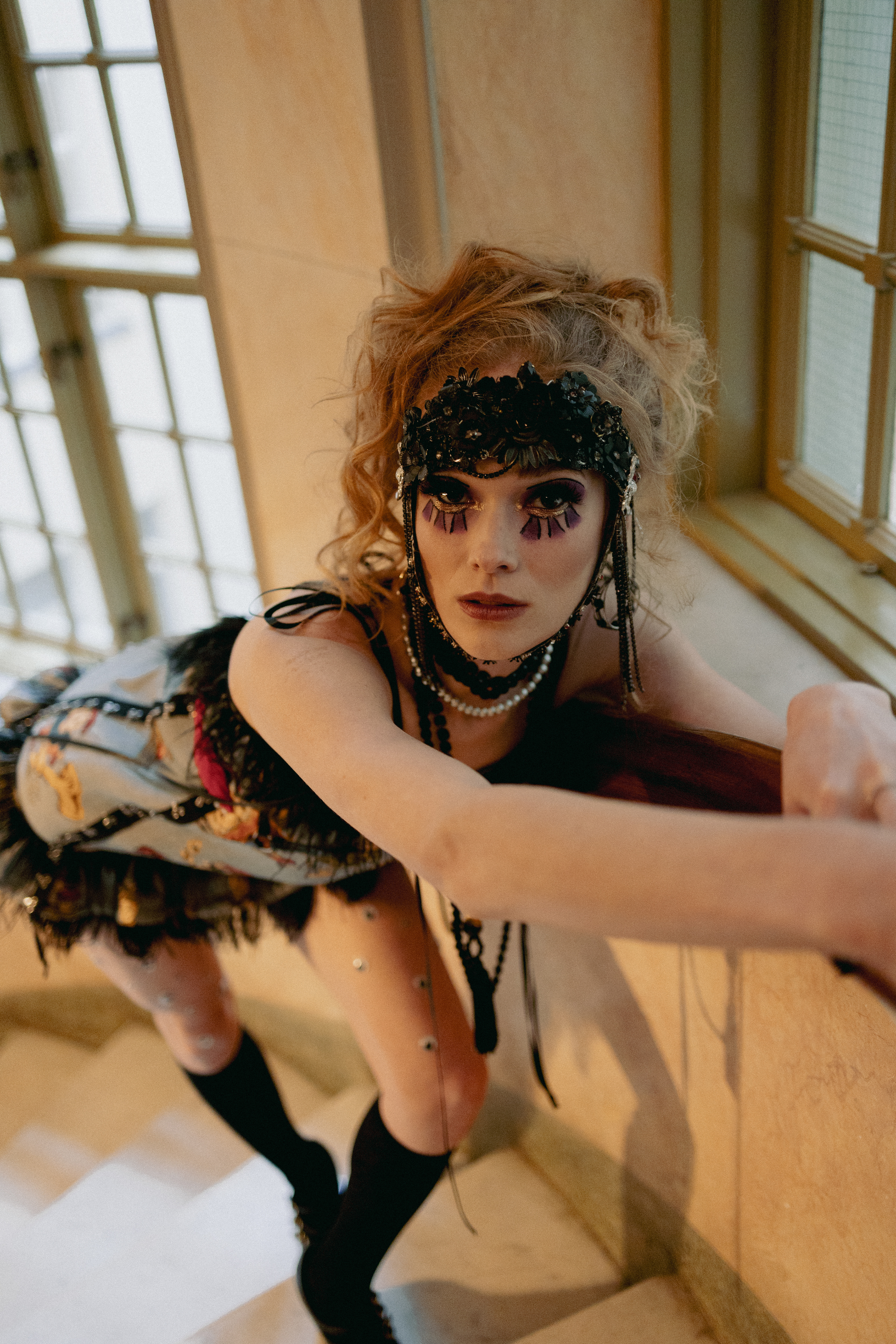 Sasha Sytenko — editorial portrait with beaded headpiece.