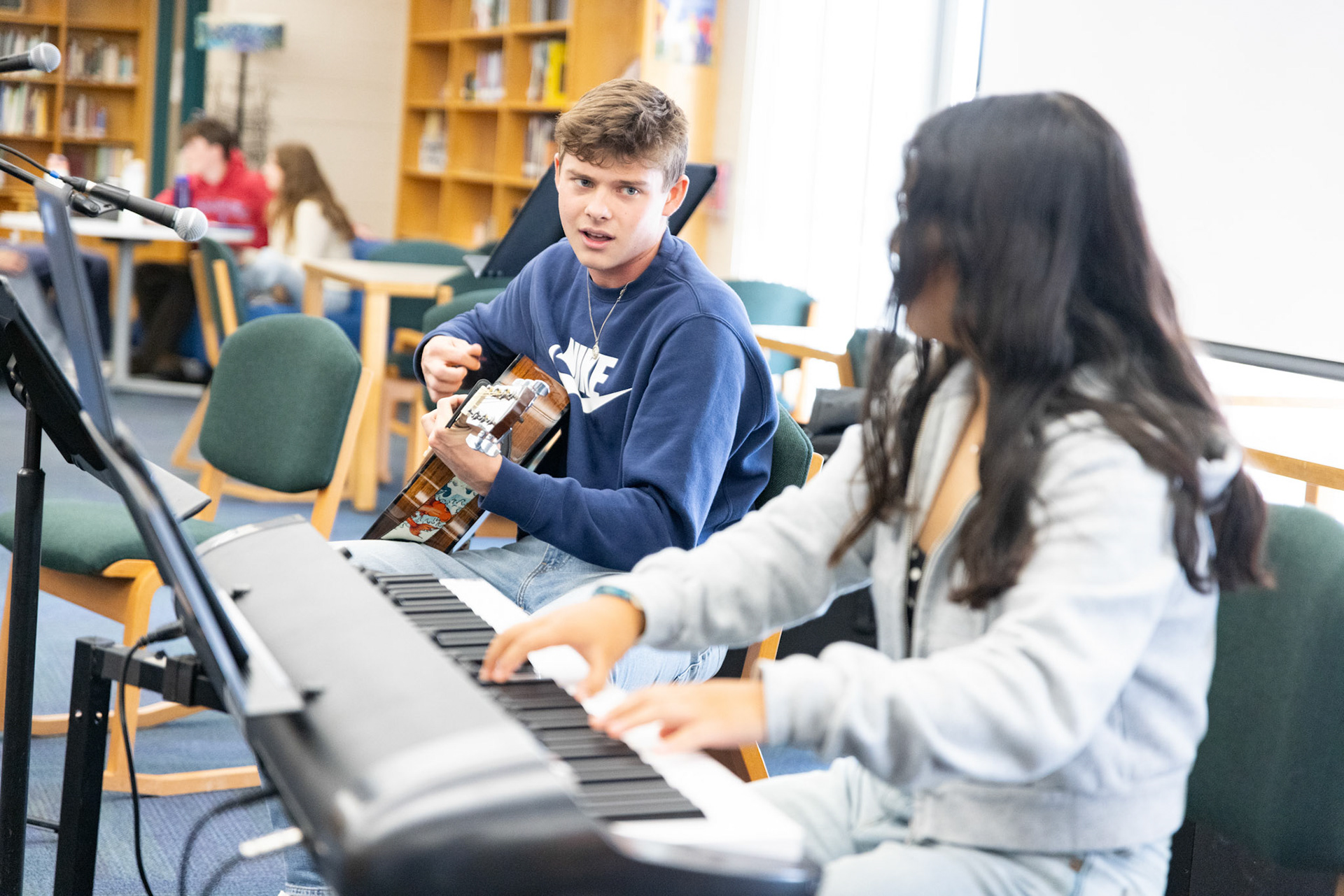 Coffee house performers serenade the library on Jan. 8.