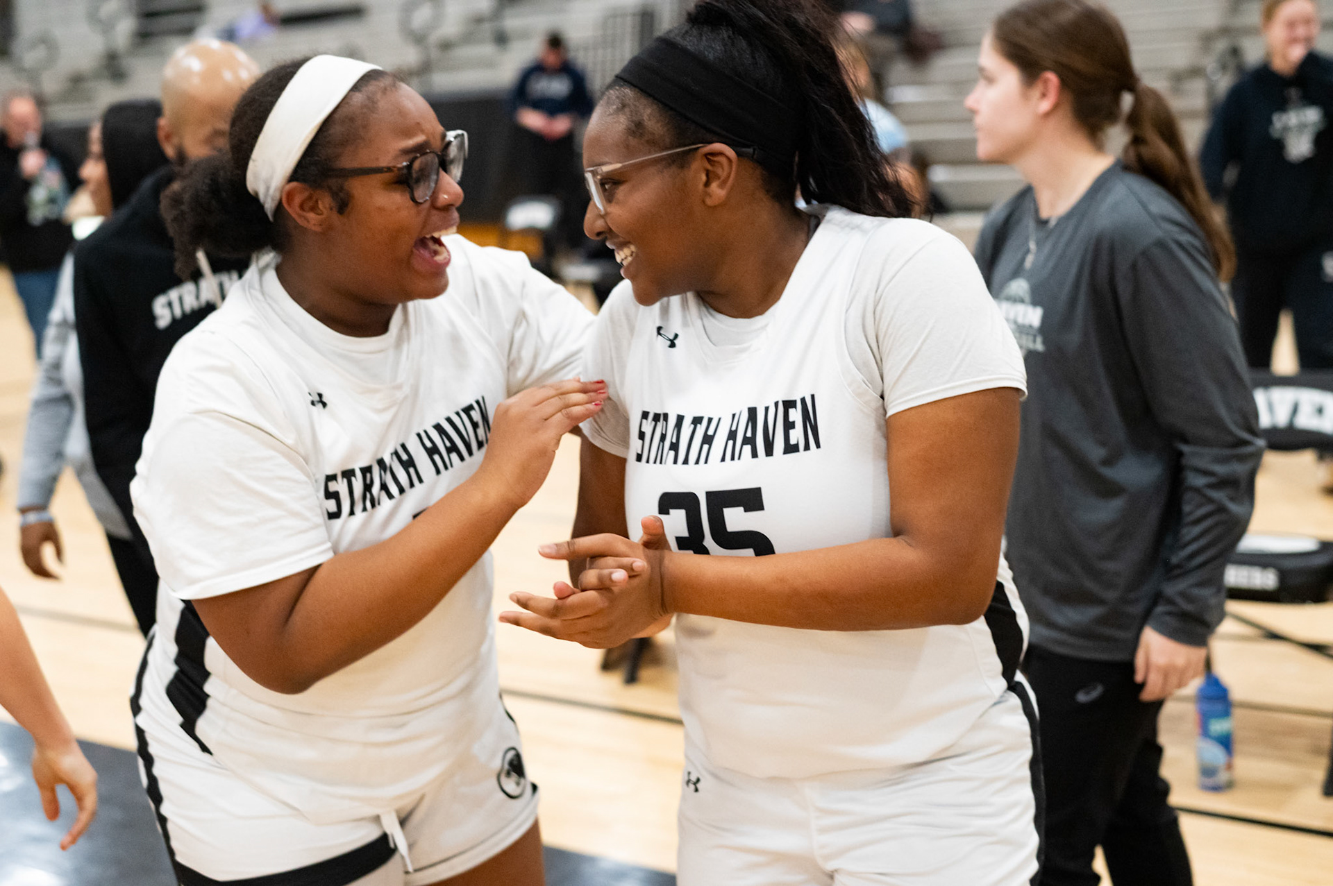 Airion Smith ’27 celebrates with Mariah Cox ’26 after the varsity girls basketball senior night victory on Jan. 8.