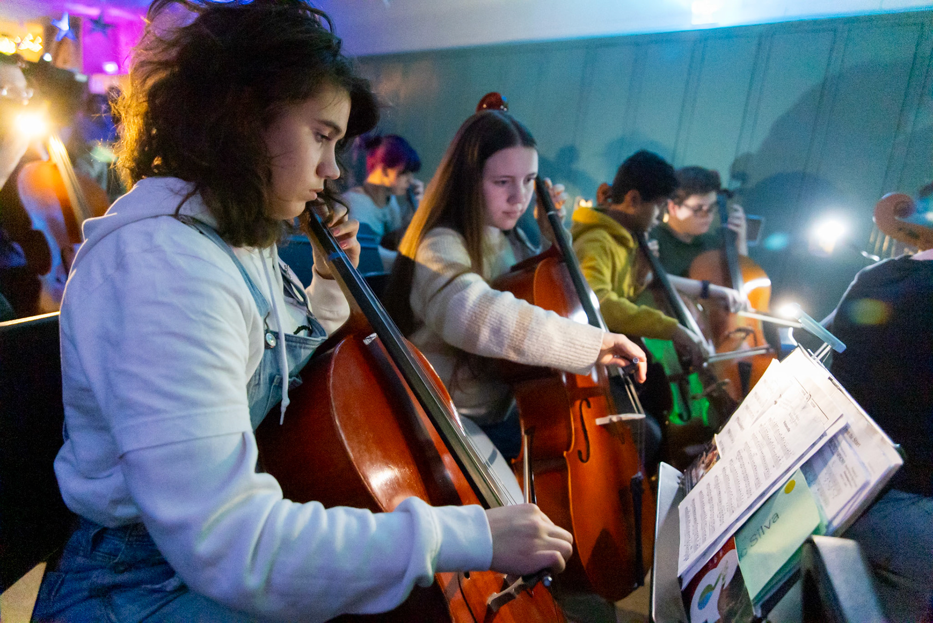 The symphony orchestra takes over the second floor hallway for their concert on Dec. 17.