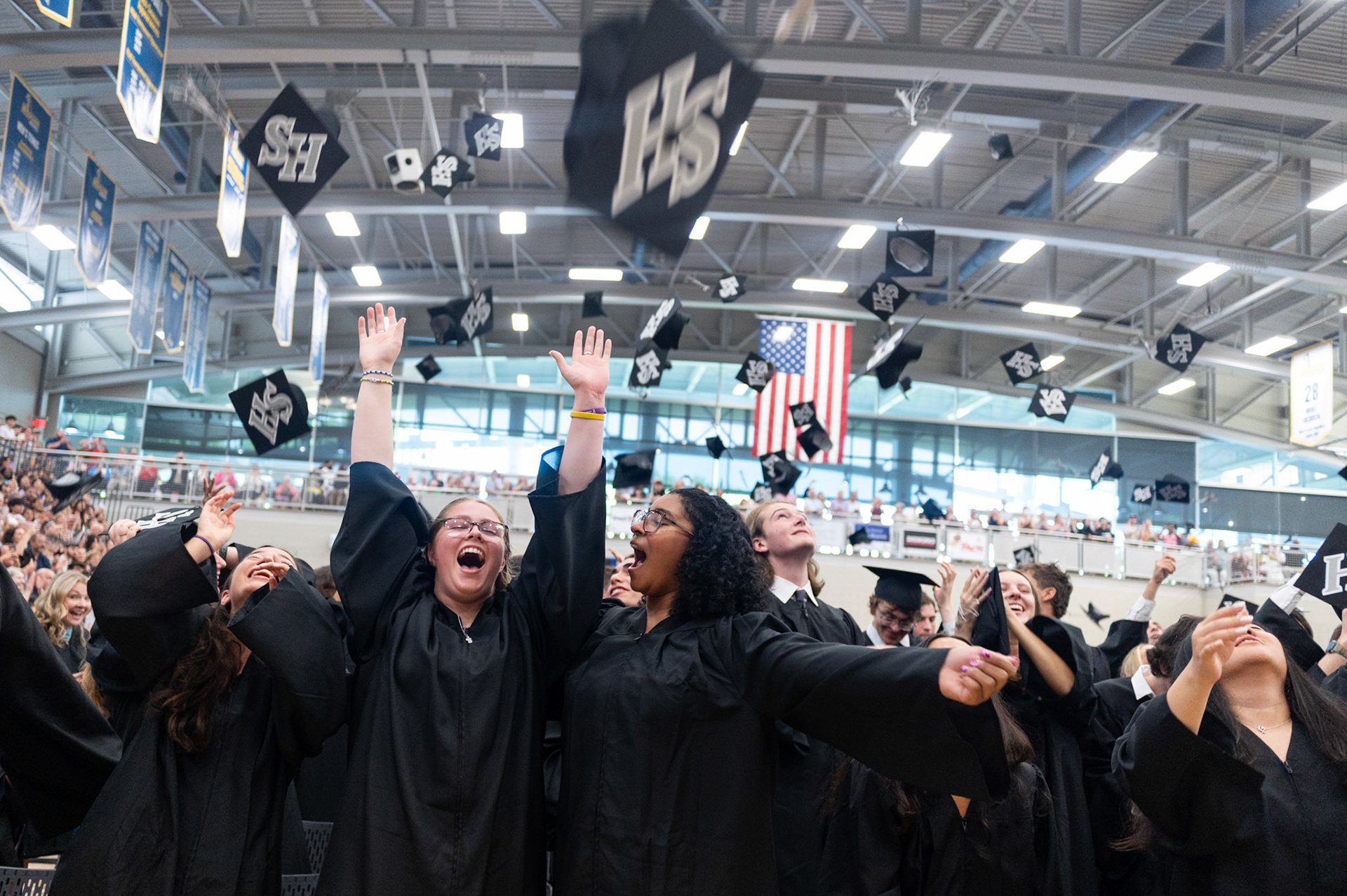 Ella Liberi '25 and Zoe Likely '25 celebrate after the tassel turning ceremony at the Class of 2025 commencement Commencement at the Mirenda Center on June 6.