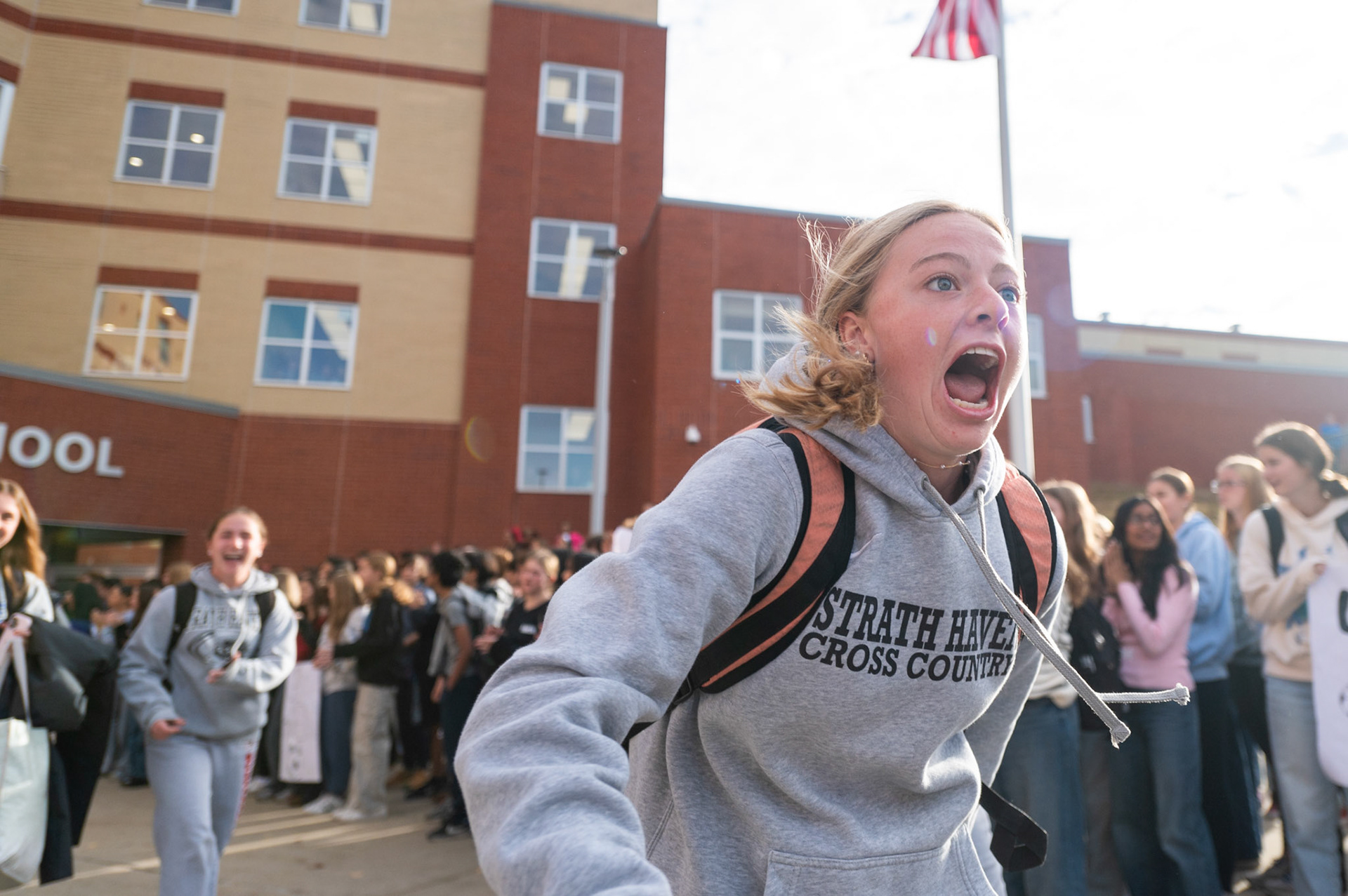 Team captain Annie Dignazio '25 keeps the energy up as she boards the bus to travel to compete in the girls soccer PIAA 3A state final championship game on Nov. 15, 2024. The Panthers won 1-0 against Lower Lower Dauphin.