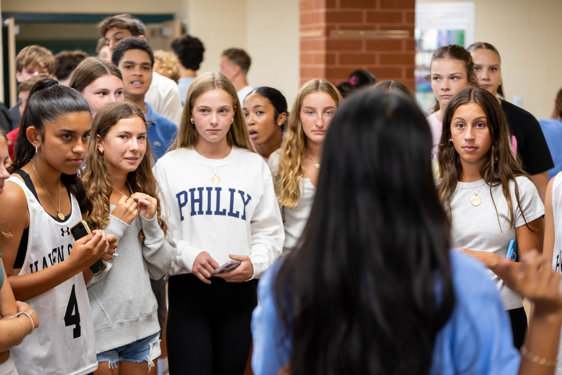 Daksha Nair '26 leads the incoming Strath Haven freshman Class of 2029 on a tour of the high school on Aug. 20, 2025.