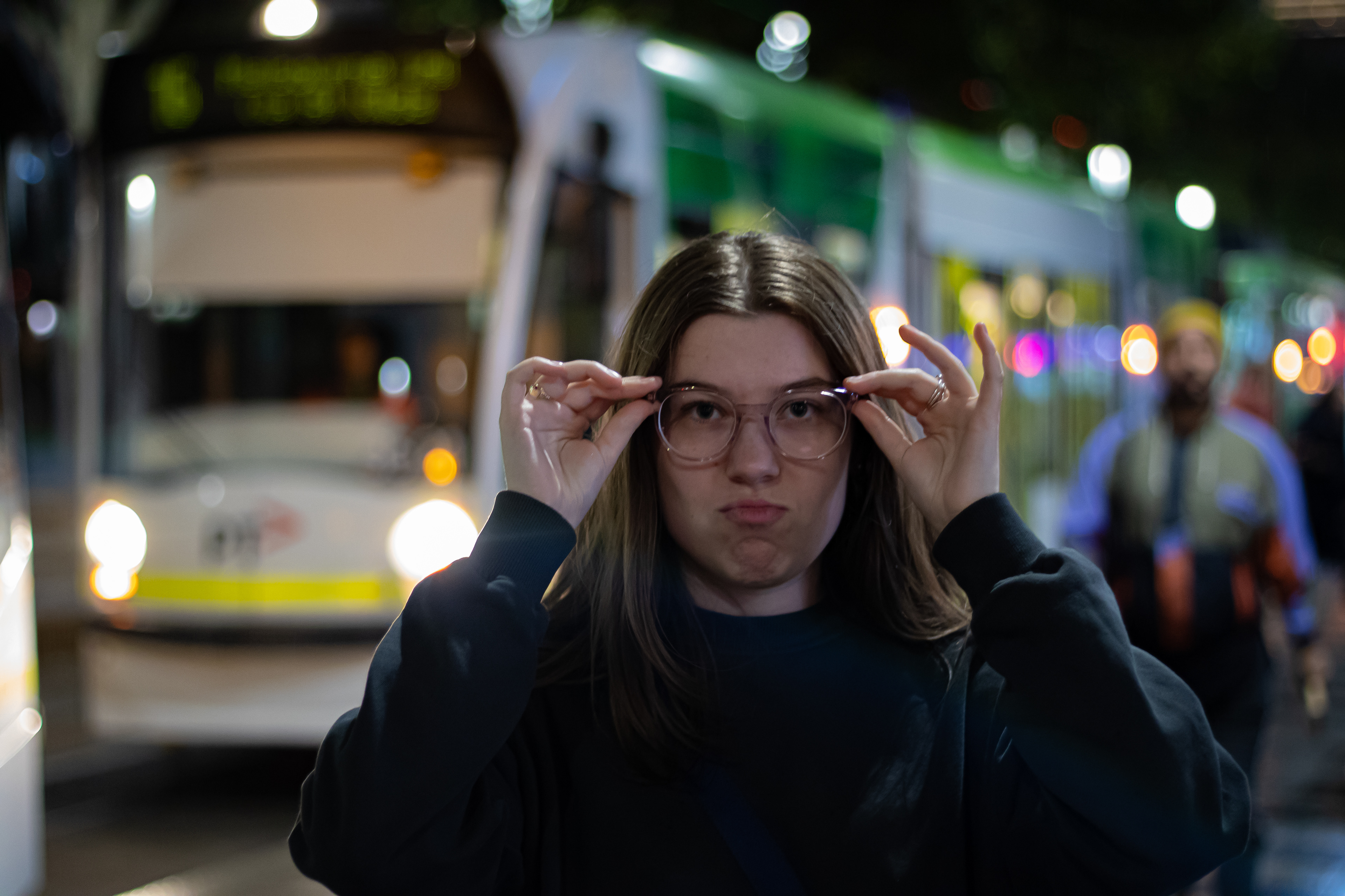 Photo 2 - Portrait with shallow depth of field with blurry lights in the background