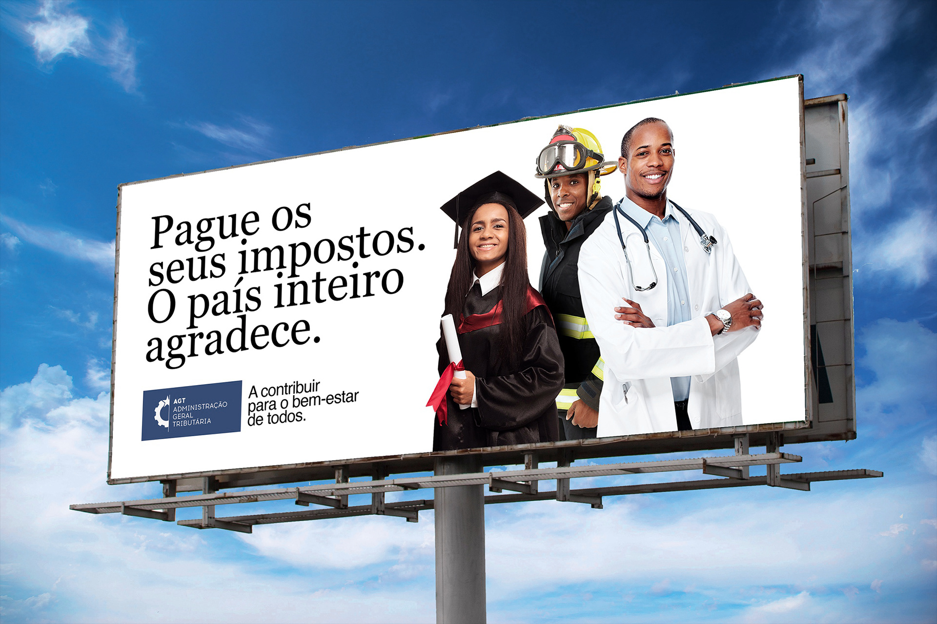 A billboard promotes tax payment with the message "Pague os seus impostos. O país inteiro agradece." It features images of a graduate, firefighter, and doctor, representing societal beneficiaries of taxes.