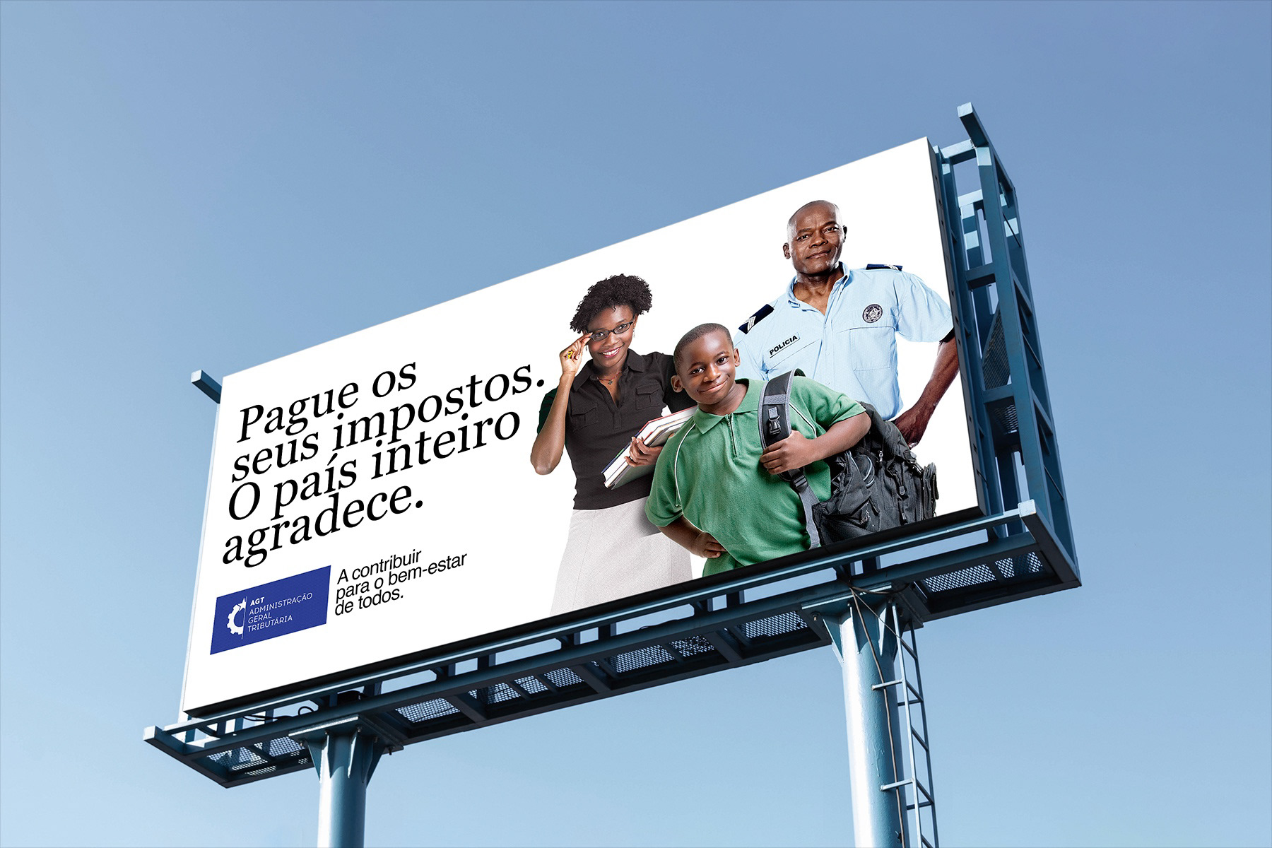 A billboard in Portuguese reads, "Pague os seus impostos. O país inteiro agradece." It features a teacher holding books, a police officer in uniform, and a child with a backpack, highlighting societal benefits of tax contributions.