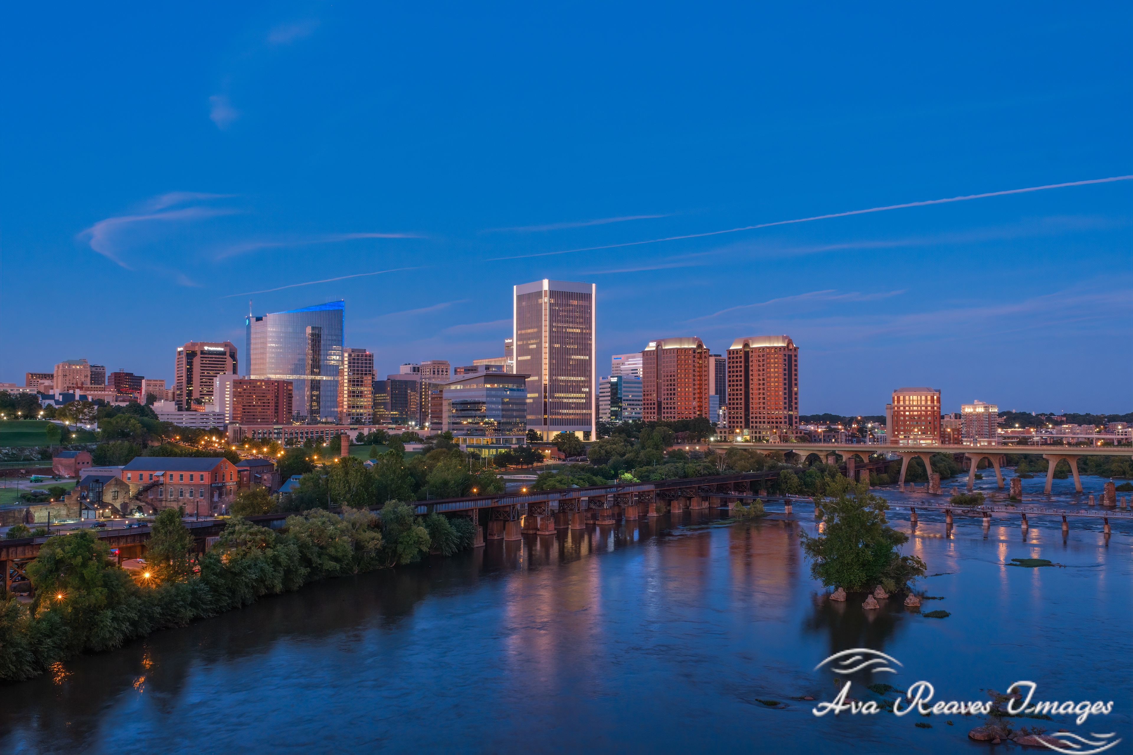 The Richmond Virginia skyline reflected in the James River at Twilight