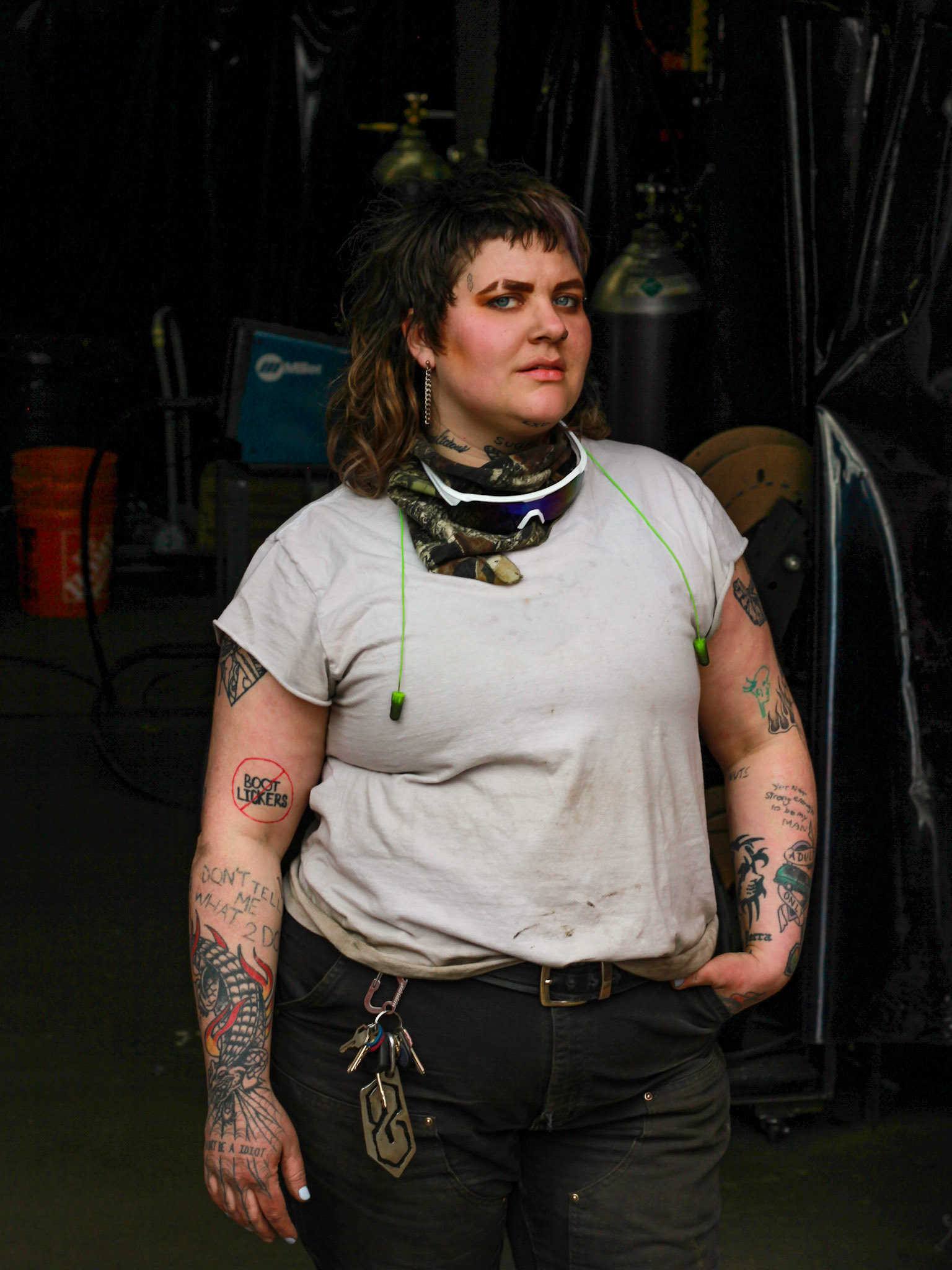 Jo, They/Them. queer, non-binary/trans. Former restaurant worker turned welder. . “I spent the majority of my industrial welding career as a boilermaker. There I found all the excitement, travel, adrenaline, accolades and money I had ever wanted. However, in the Spring of 2020 a veil was lifted, and I had to remove myself from the toxic environment I had so deeply embraced and adapted to. The racism, sexism and homophobia was rampant, and I suddenly realized how complacent I had become. I had taken on a mask of toxic masculinity as a survival mechanism, and not only that but I had subconsciously become a raging capitalist. When I left, I took time to heal. I began working on identifying how I had allowed myself to fall so deeply into this harmful culture. As I began studying my own racist and sexist tendencies, I was suddenly awakened to the fact that I had been able to blend in so easily because I myself identified as one of the boys, one of the straight white males who coasted through life with all the privilege in the world. And this was in fact how I discovered my transness. Eventually I came to the realization that the only way to make the trades a safe place would be to dilute the current demographic. People's Inclusive Welding was established with the hope of creating a new wave of tradespeople, one that does not participate in the gatekeeping and toxic behavior of the current skilled trades industry. I am so lucky to have found an amazing team to support me and my dream of creating an inclusive welding school in which ALL demographics of folks can feel safe. PIW is the program I wish I had had as a queer person. It's my reparation for the complacency I adopted, and it's my version of mutual aid to folks who want a leg up into a new career. It's a dream come true to see it come to fruition, and I can't wait to see where we go from here.”