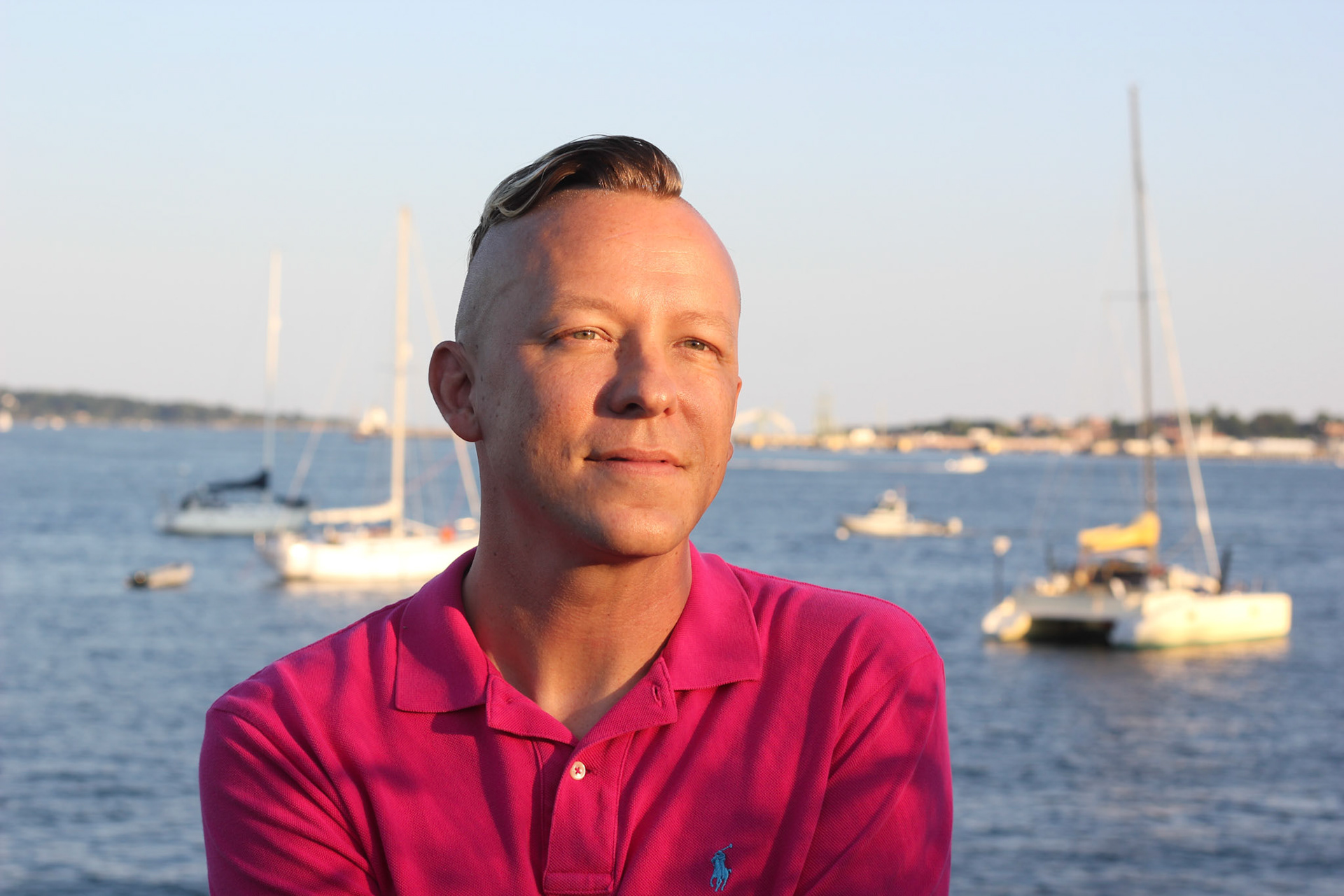 Daniel, He/Him . “Family has always meant a lot to me. I was born at Maine Medical Center and adopted at 3 weeks old. My parents moved to New Jersey where I grew up. Growing up in the 80s, in a small town in New Jersey wasn't easy for a queer kid. I was bullied from the age of 12 until the day I graduated high school. Once I reached college it would take me 2 more years to find the courage to come out and finally start living as my authentic self. After college I moved to Brooklyn and started to build and find my queer family. A family of love, support, shared experiences, and life long friendships. I lived there for 21 years and those were the most impactful years of my life. And now I am back. Back to where my journey started. My husband works at Maine Medical Center, I have a huge biological family all around, and have started to find a new queer family of friends here in Maine. Recently, I started a monthly Queer Family gathering with some old and new friends and am hoping to have it be a regular thing that allows for any and all queer Mainers to have a place to be supported and celebrated. Because no matter how a family is created, everyone deserves to be a part of a family of love.”