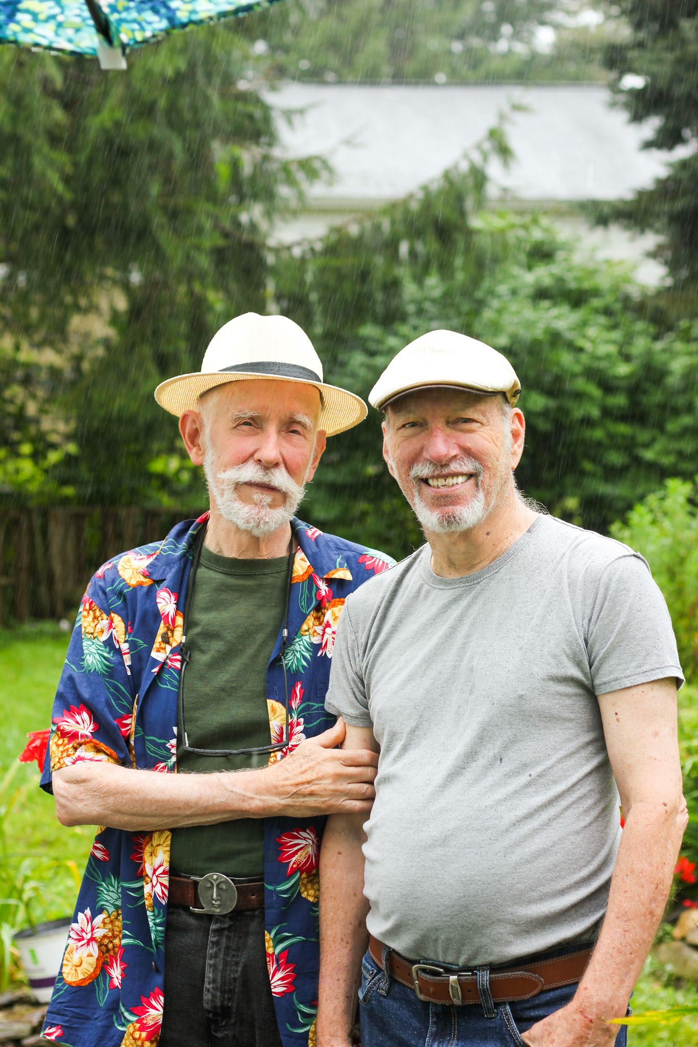 Howard, He/Him. George, He/Him . “George, he/him, 77 & Howard, he/him, 81. Yin–Yang meets introvert–extrovert: cook–artist, scientist–jokester, dancer–tai chi practitioner, linguist–historian, New Orleans Italian–Western PA Jew. We met each other late in life, navigating our aging selves apart and then together—winked online in 2009, married since 2020. Each year we get closer to our truth as individuals and as a couple. George wants to create community through the synchronous movement of line dancing and preparing food at community meals; Howard wants to move a community emotionally through his collage art as well as his gay activism and knowledge of Jewish history. We move each other through love and devotion. The luck and privilege of our personal lives, and our many years as teachers, demand that we support equality and justice. We’re heartened by the current generations’ activism and commitment.”