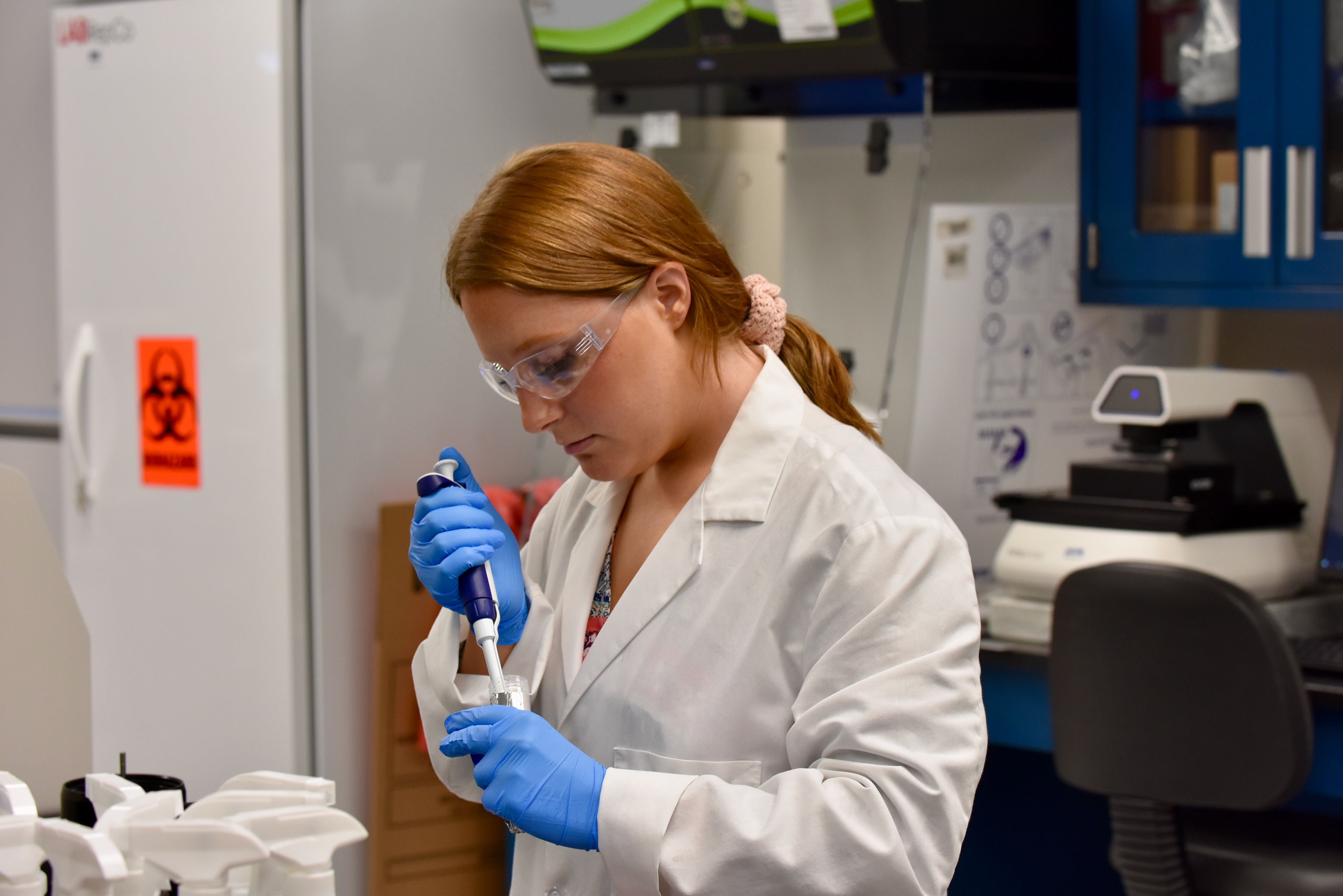 Lab technician working on setting up an experiment
