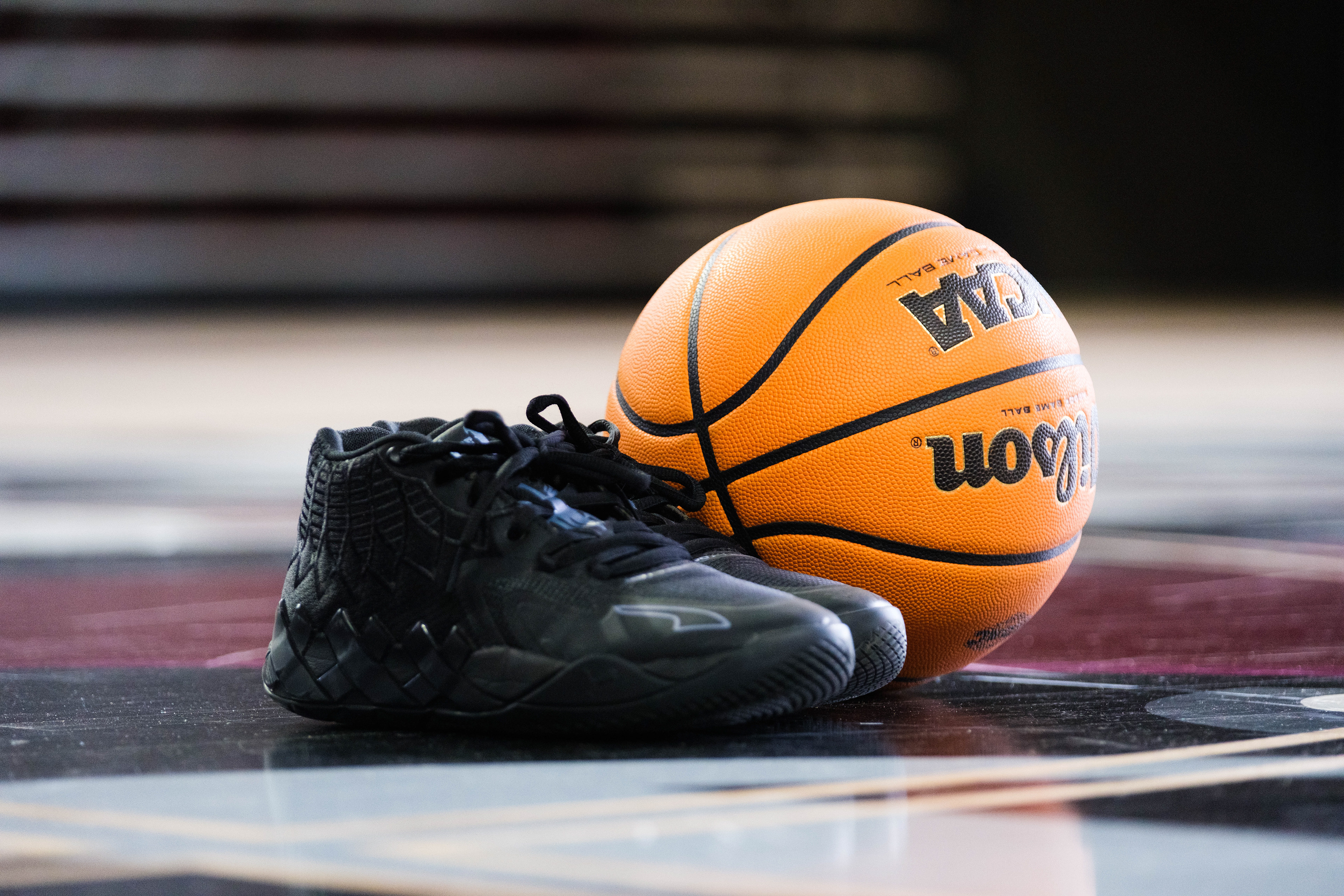 Closeup of basketball and shoes