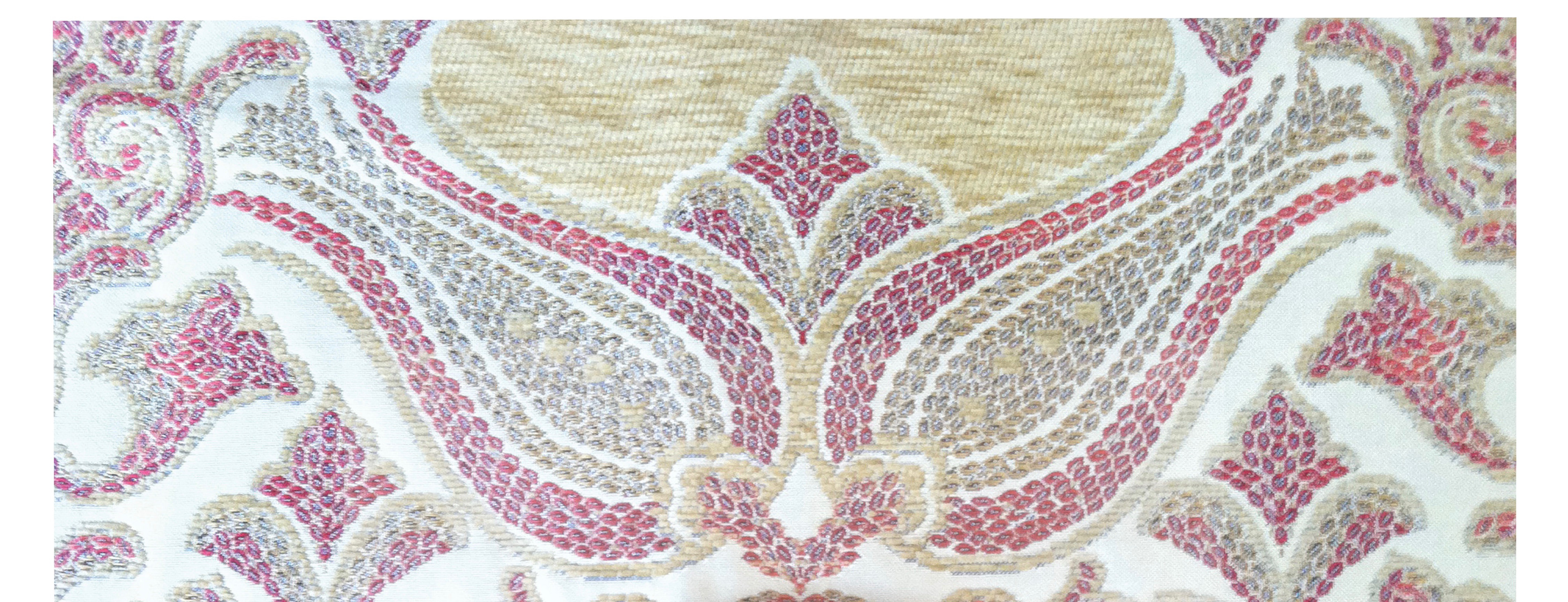 Segment of a handmade Prayer Carpet with silver threading adorning the Tulip Turkish motif. Photo: Maissa Hamed ©