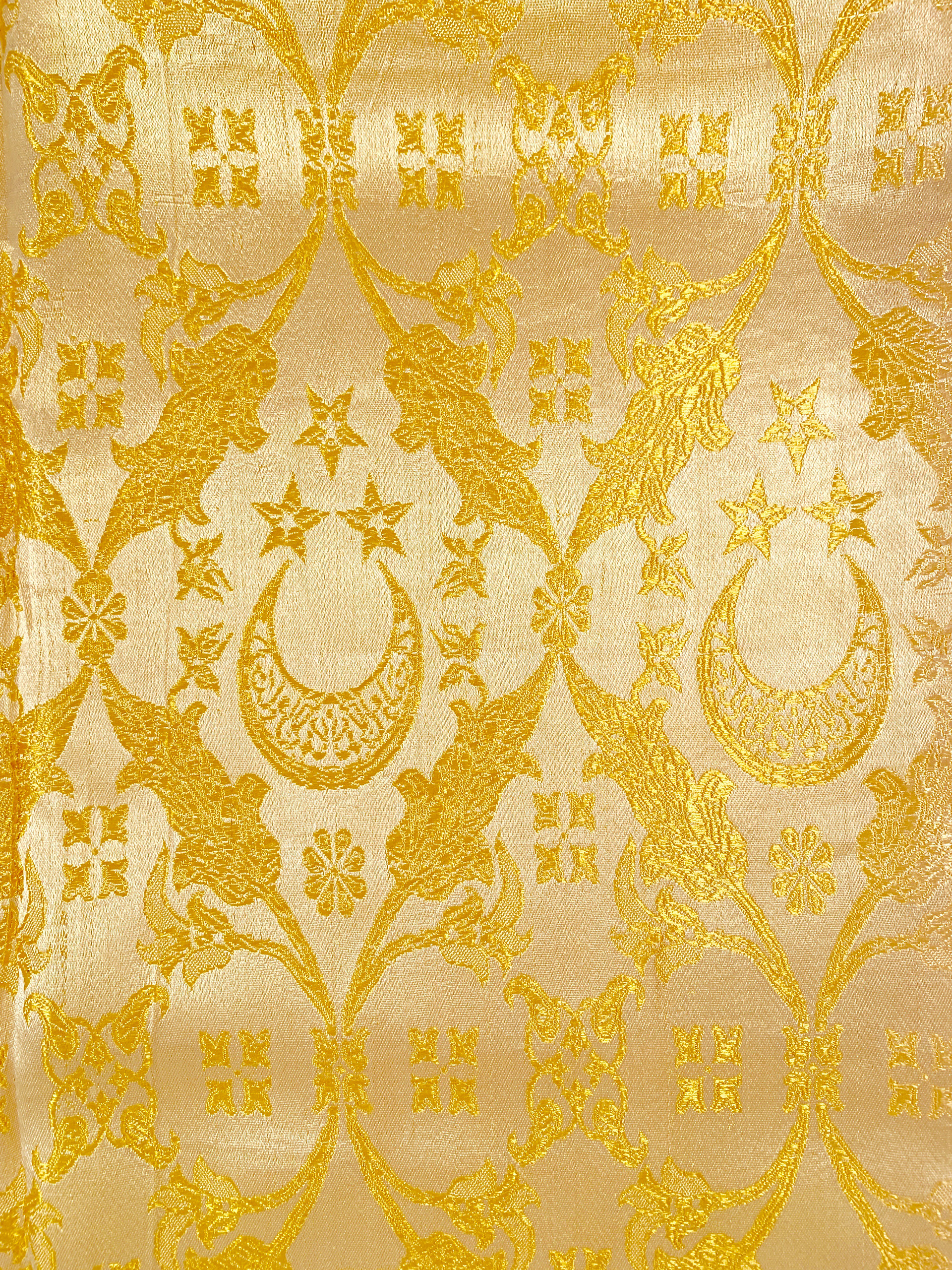 Silk throw with gold - threaded vegetal motifs encircling the crescent with three five-pointed stars, Egypt: Photo: Maissa Hamed ©