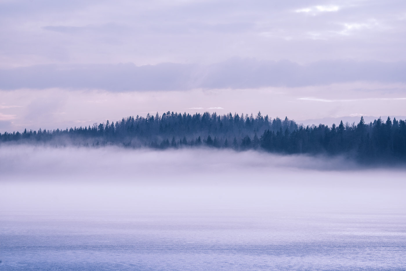 Sweden - Mist over frozen lake 