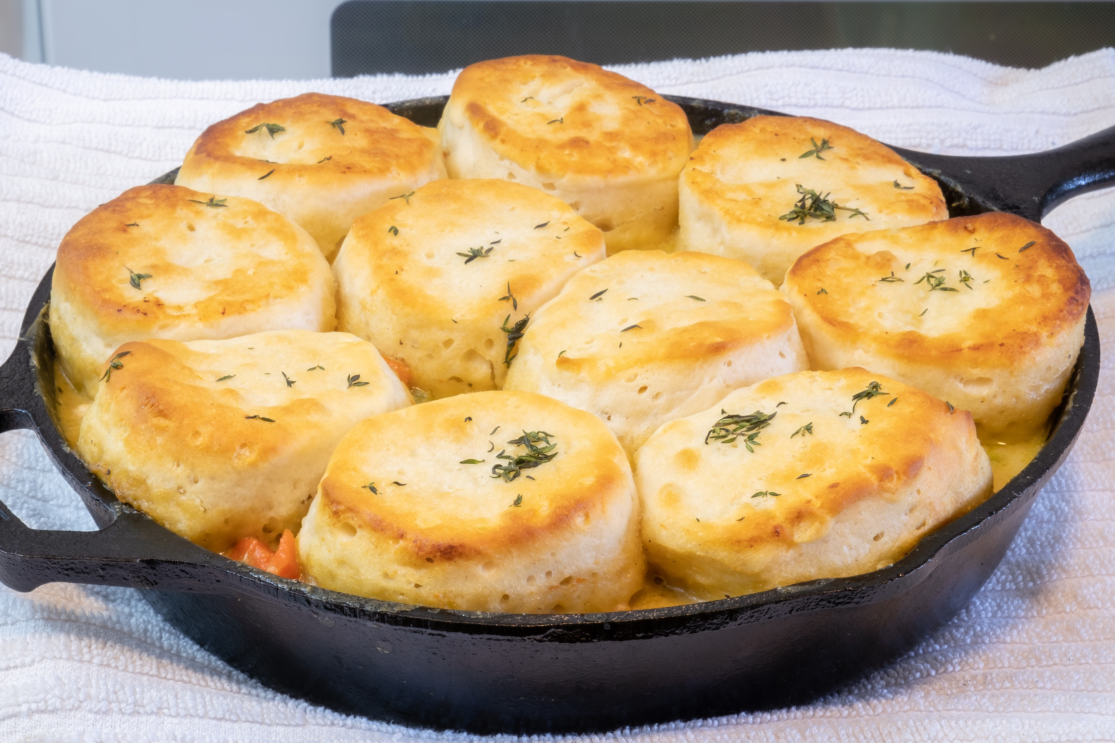 A cast iron skillet of homemade biscuits