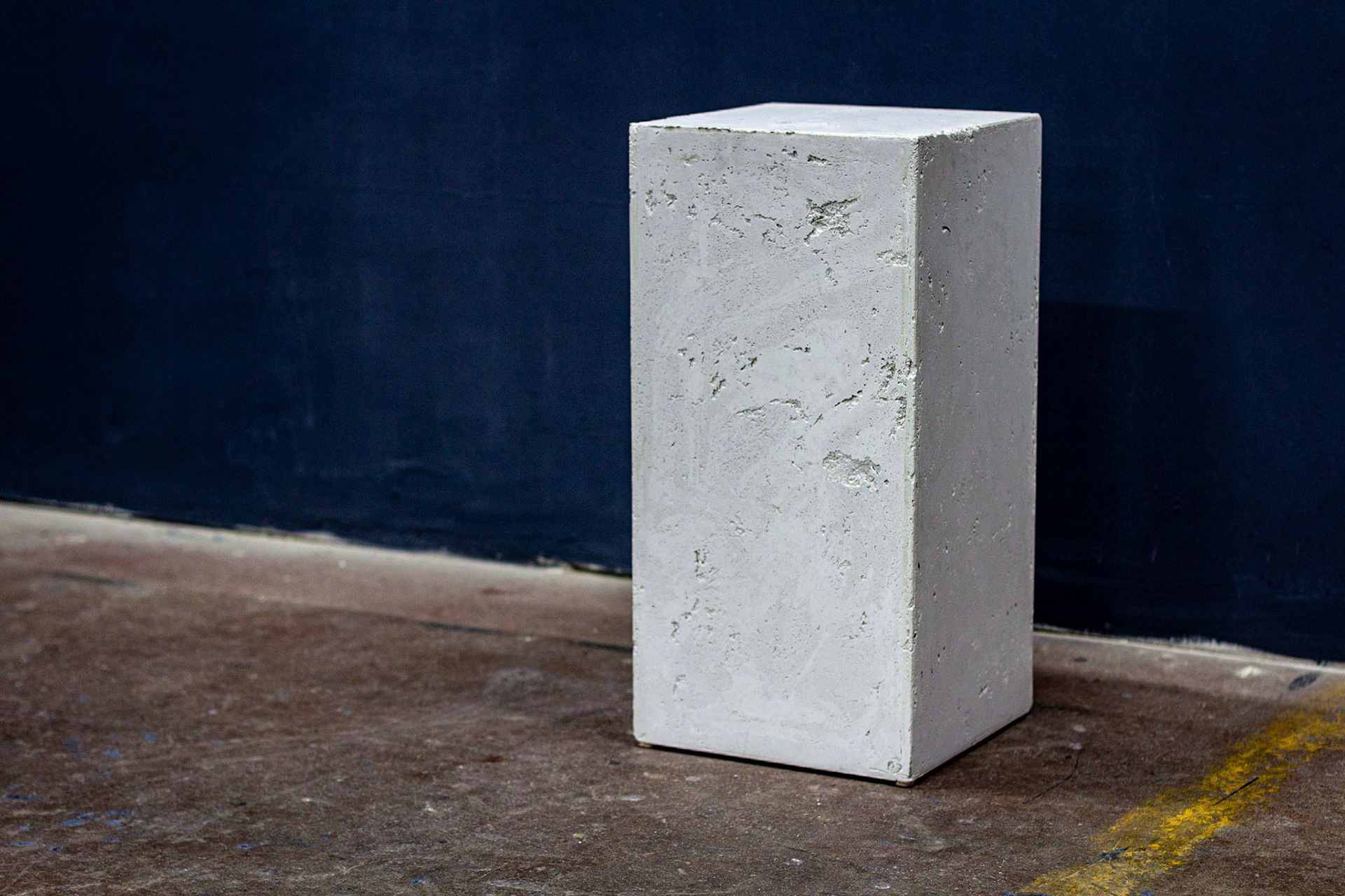 concrete side table, by Dylan Myers