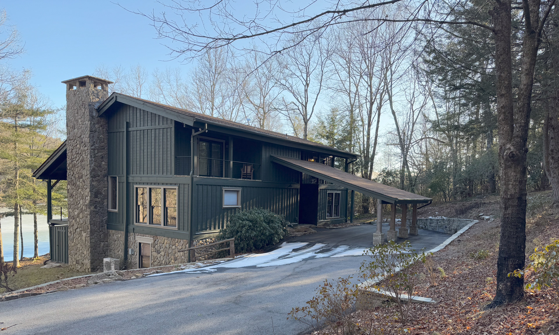 FRESH PAINT, NEW WINDOWS AND DOORS COMPLETE THIS LAKESLIDE EXTERIOR MAKEOVER