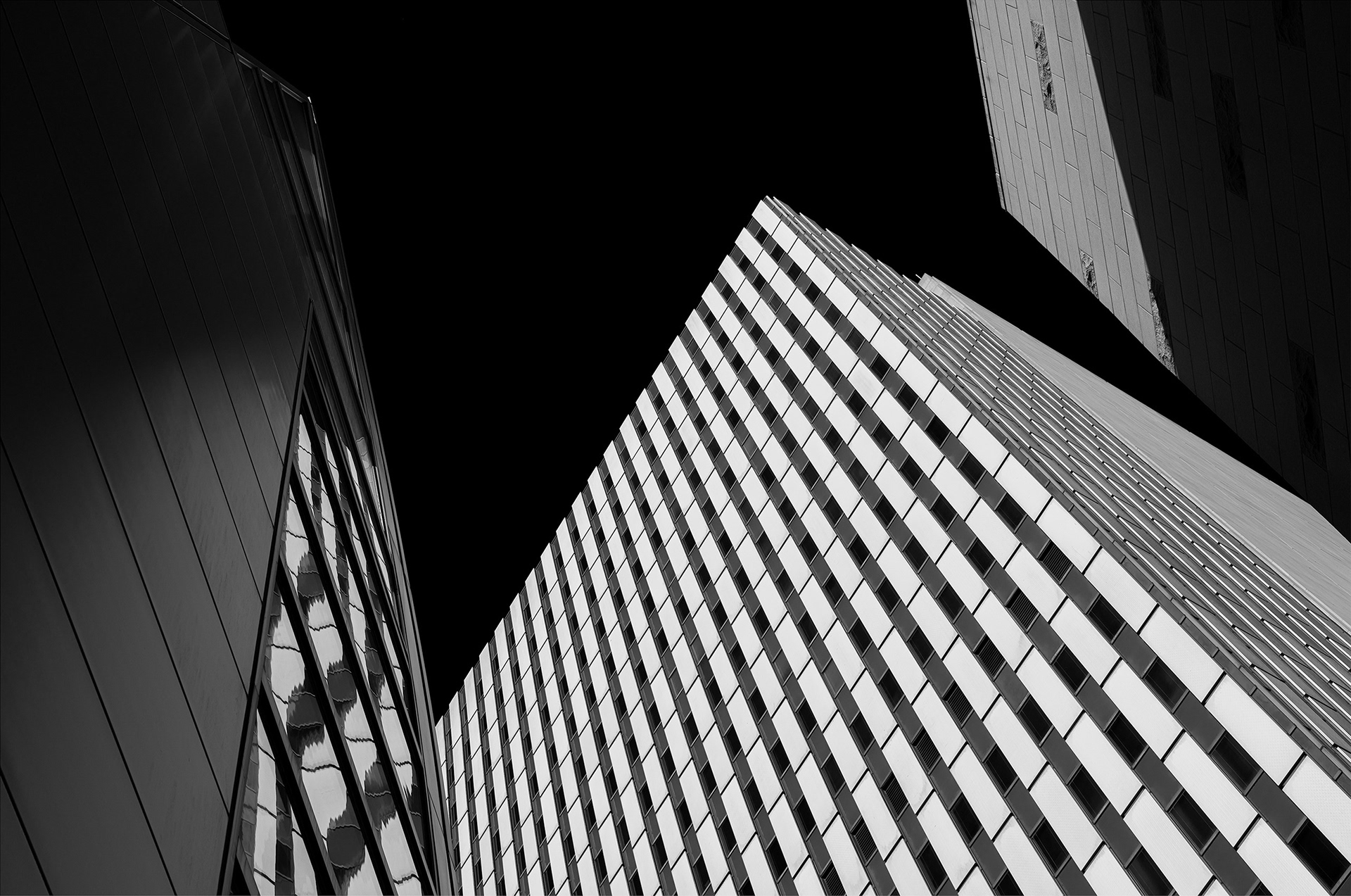 Architectural angles and strong light-shadow contrast. Studio photograph by Bucchianeri exploring modern form.